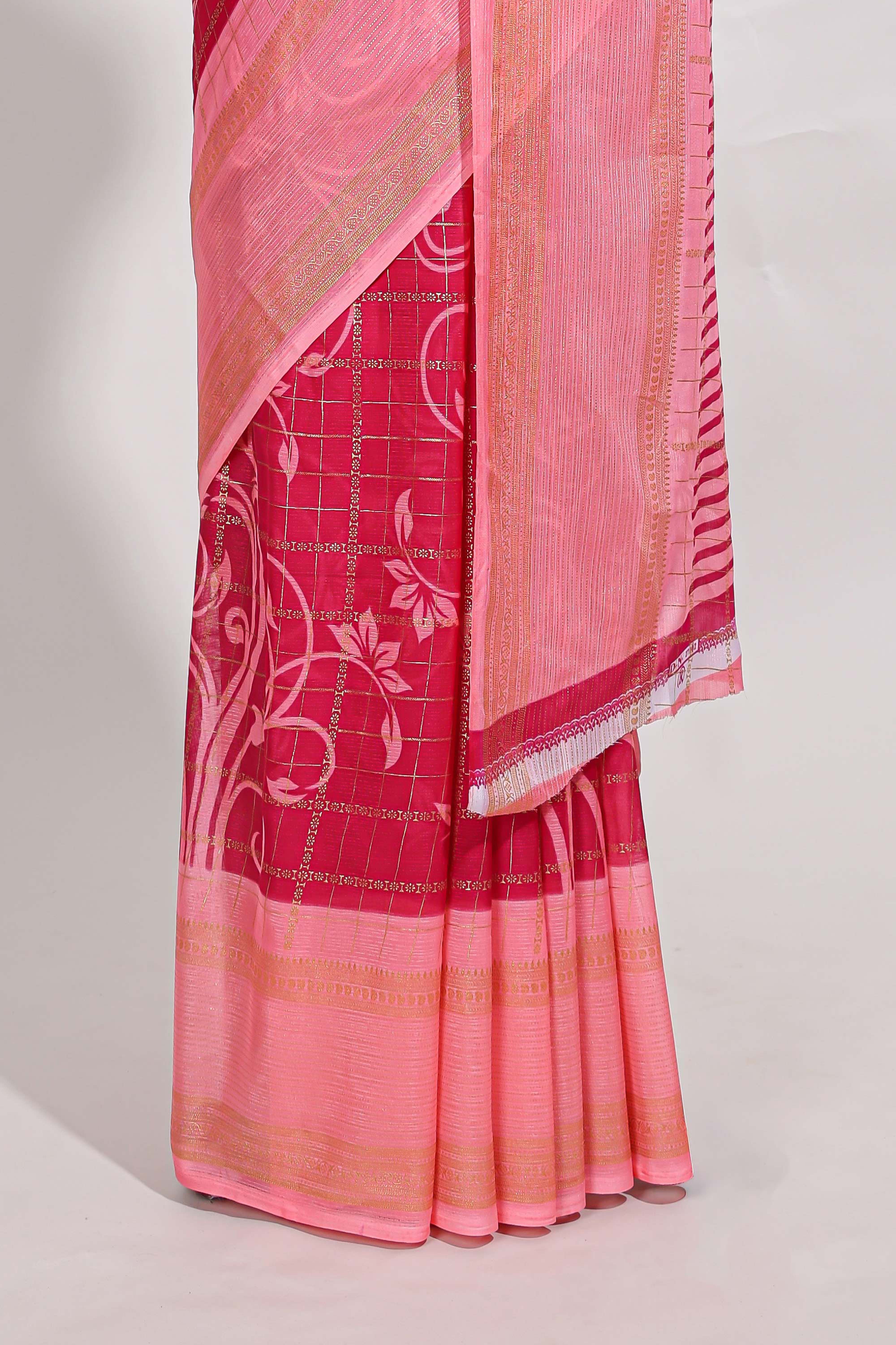 Rani pink checked floral motifs chiffon saree with self zari border and contrast blouse