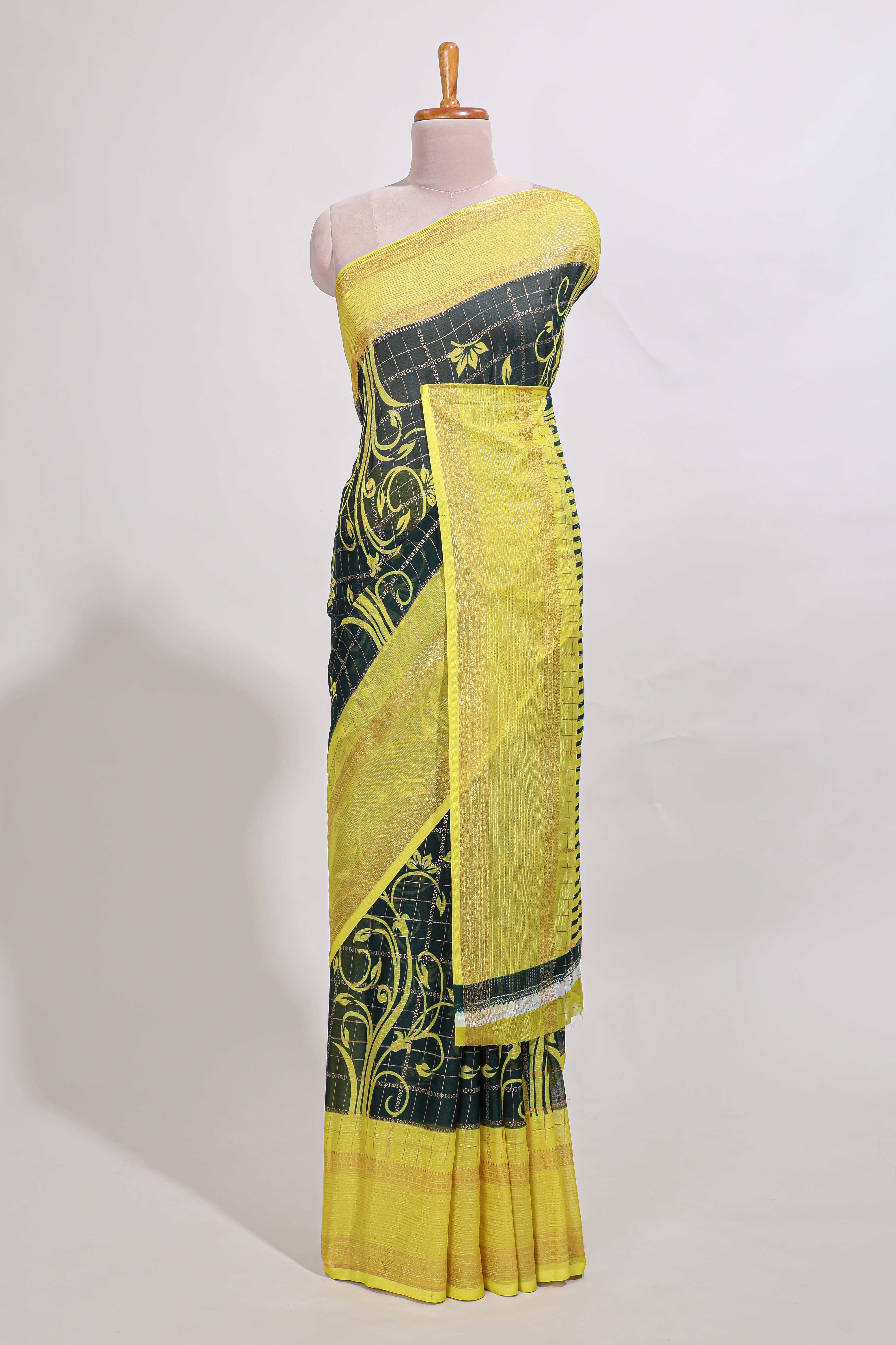 Green checked floral motifs chiffon saree with self zari border and contrast blouse