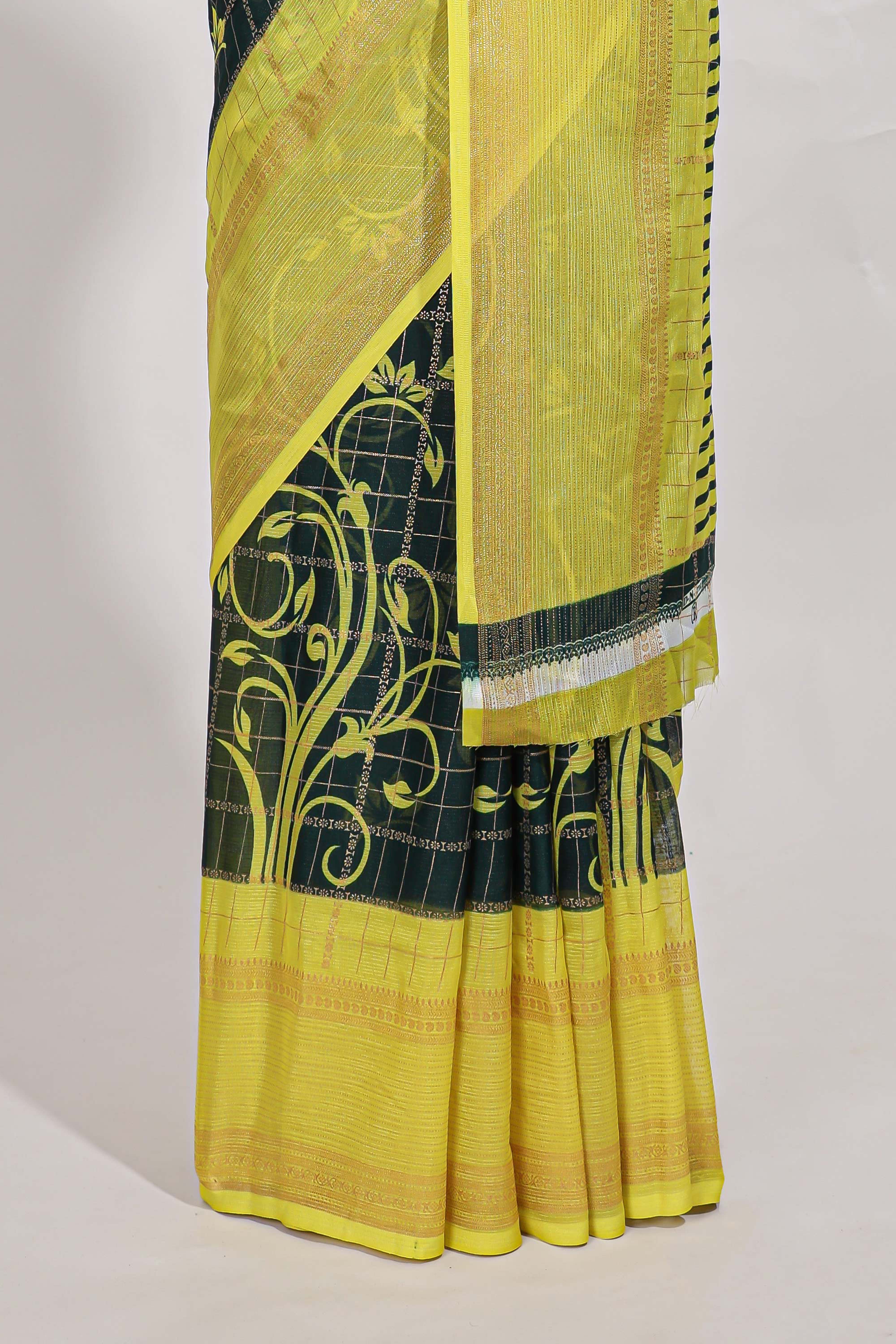 Green checked floral motifs chiffon saree with self zari border and contrast blouse