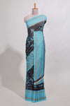 Navy blue checked floral motifs chiffon saree with self zari border and contrast blouse
