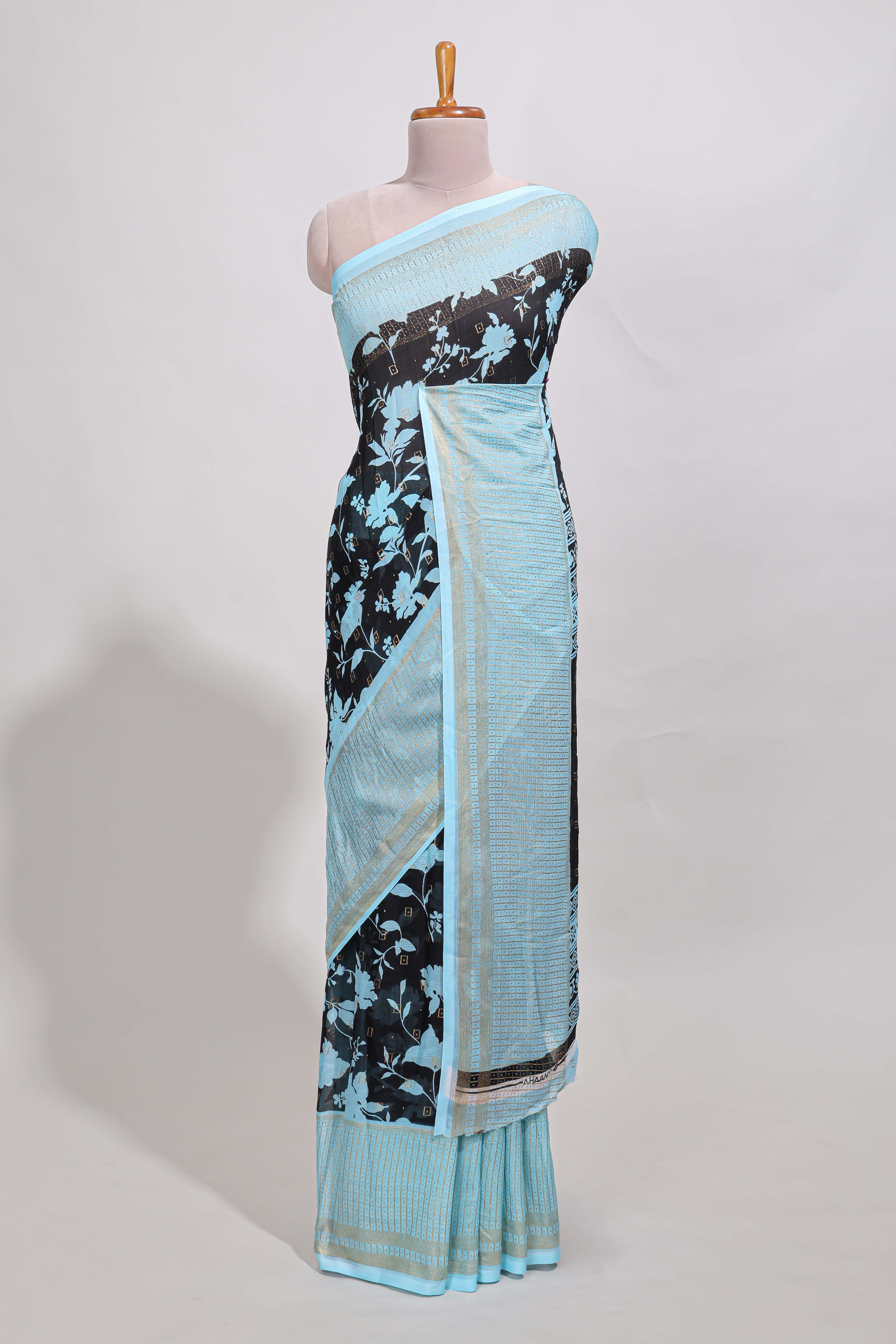 Blackwith blue checked floral motifs chiffon saree with self zari border and contrast blouse