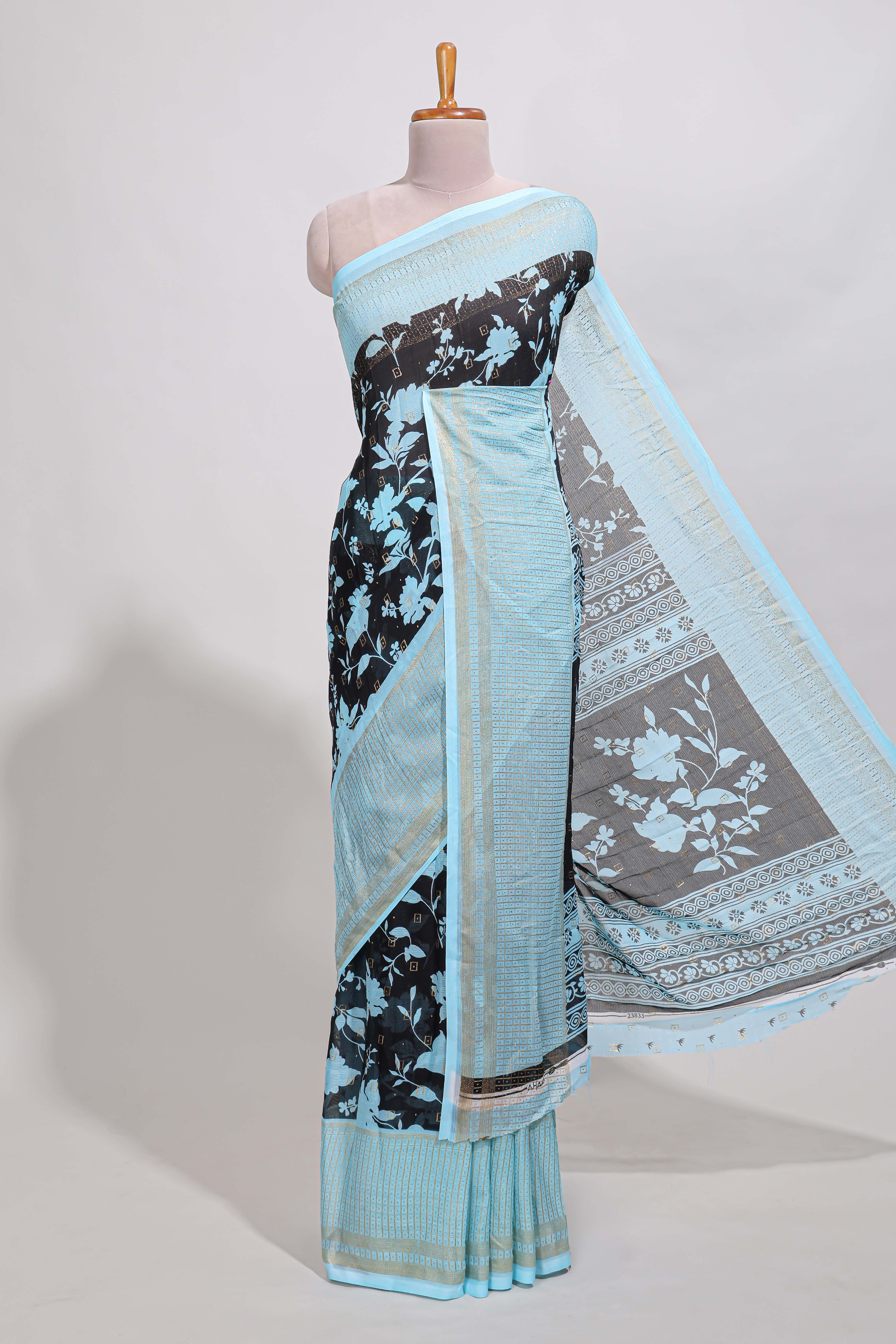 Blackwith blue checked floral motifs chiffon saree with self zari border and contrast blouse