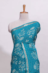 Teal blue checked with floral motifs chiffon saree with self zari border and matching blouse
