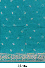 Teal green floral designed chiffon saree with self zari border and matching blouse