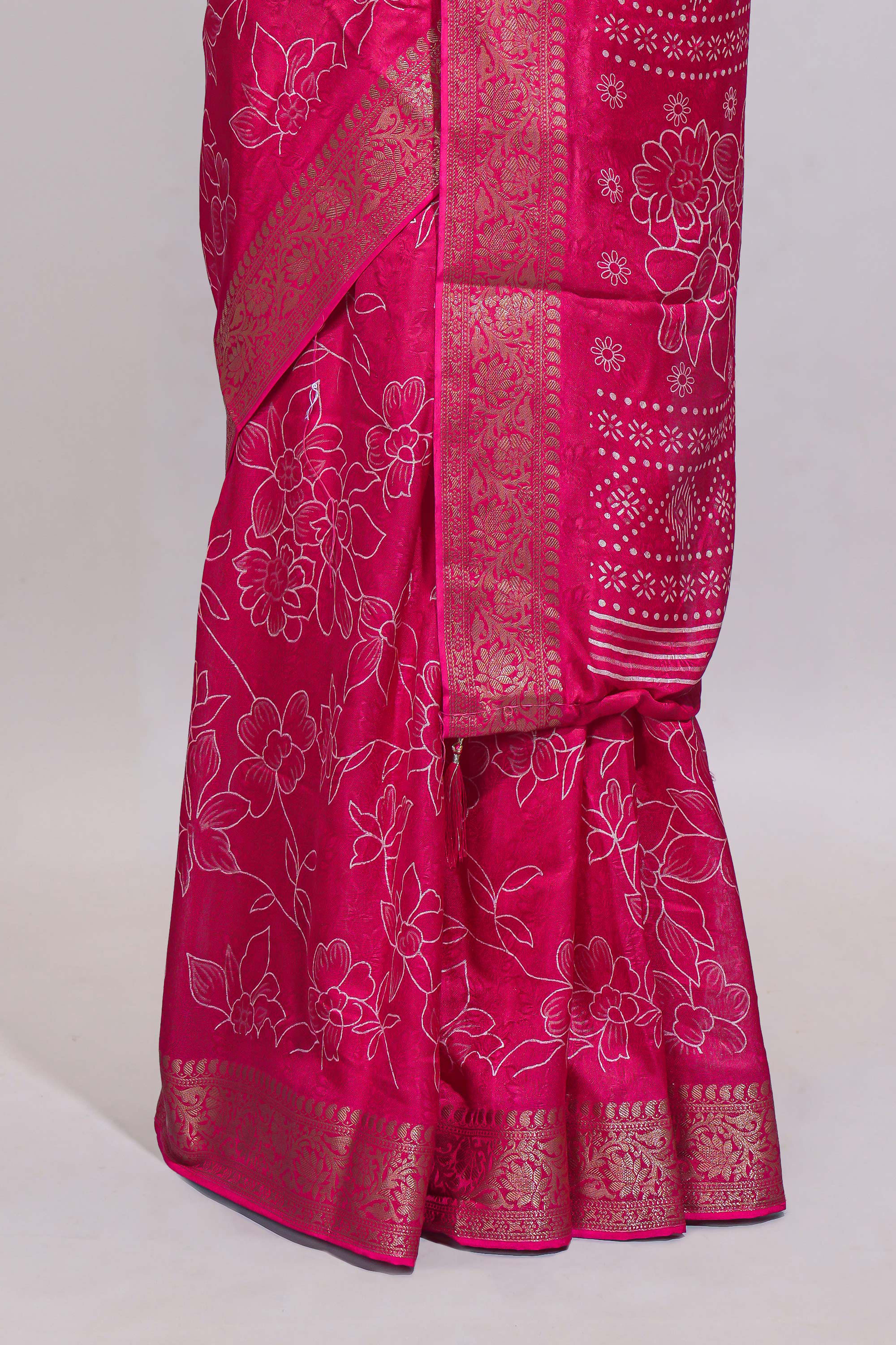 Pink floral designed chiffon saree with self zari border and matching blouse