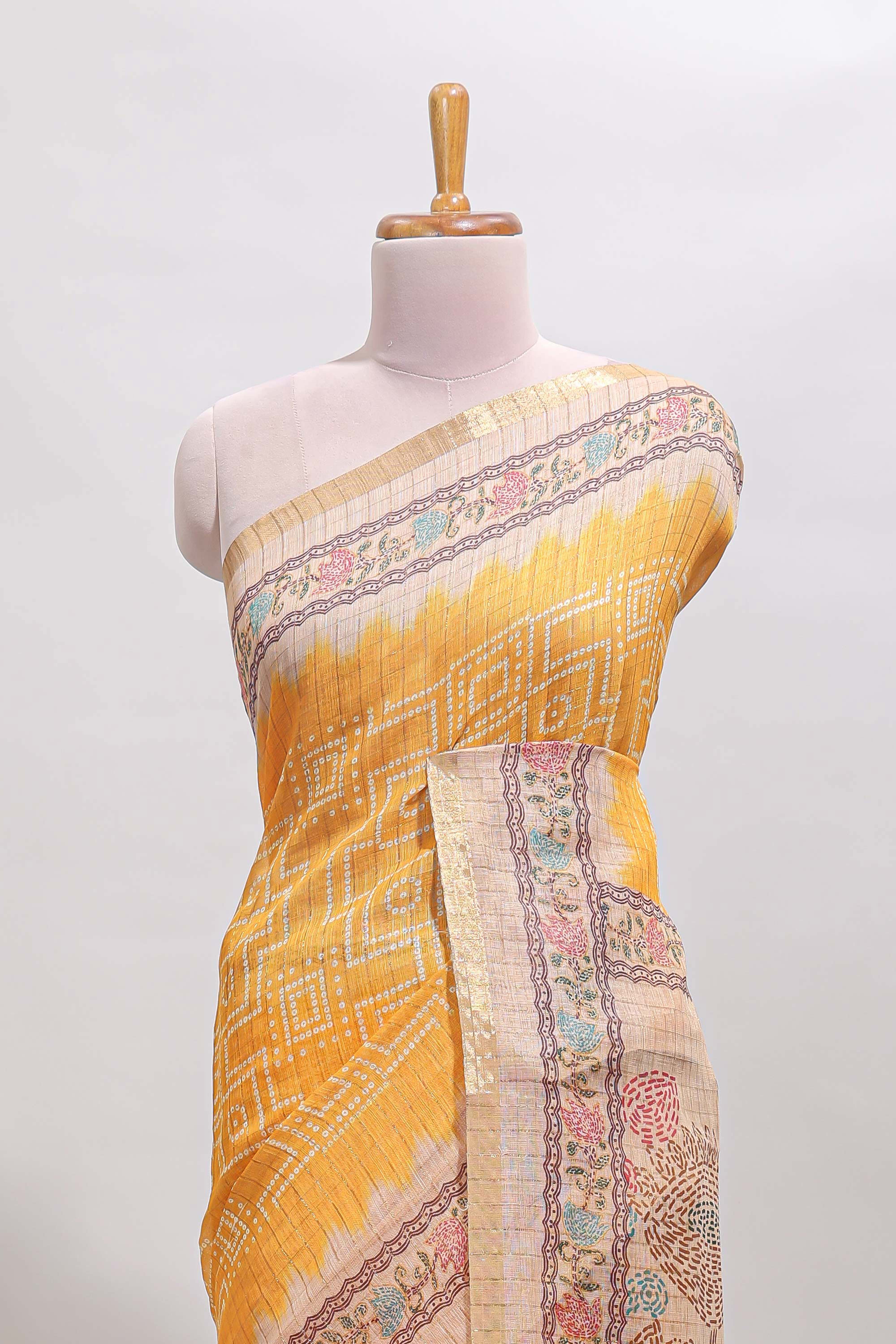 Yellow bhandhini style geometric design chanderi cotton saree with contrast border and blouse