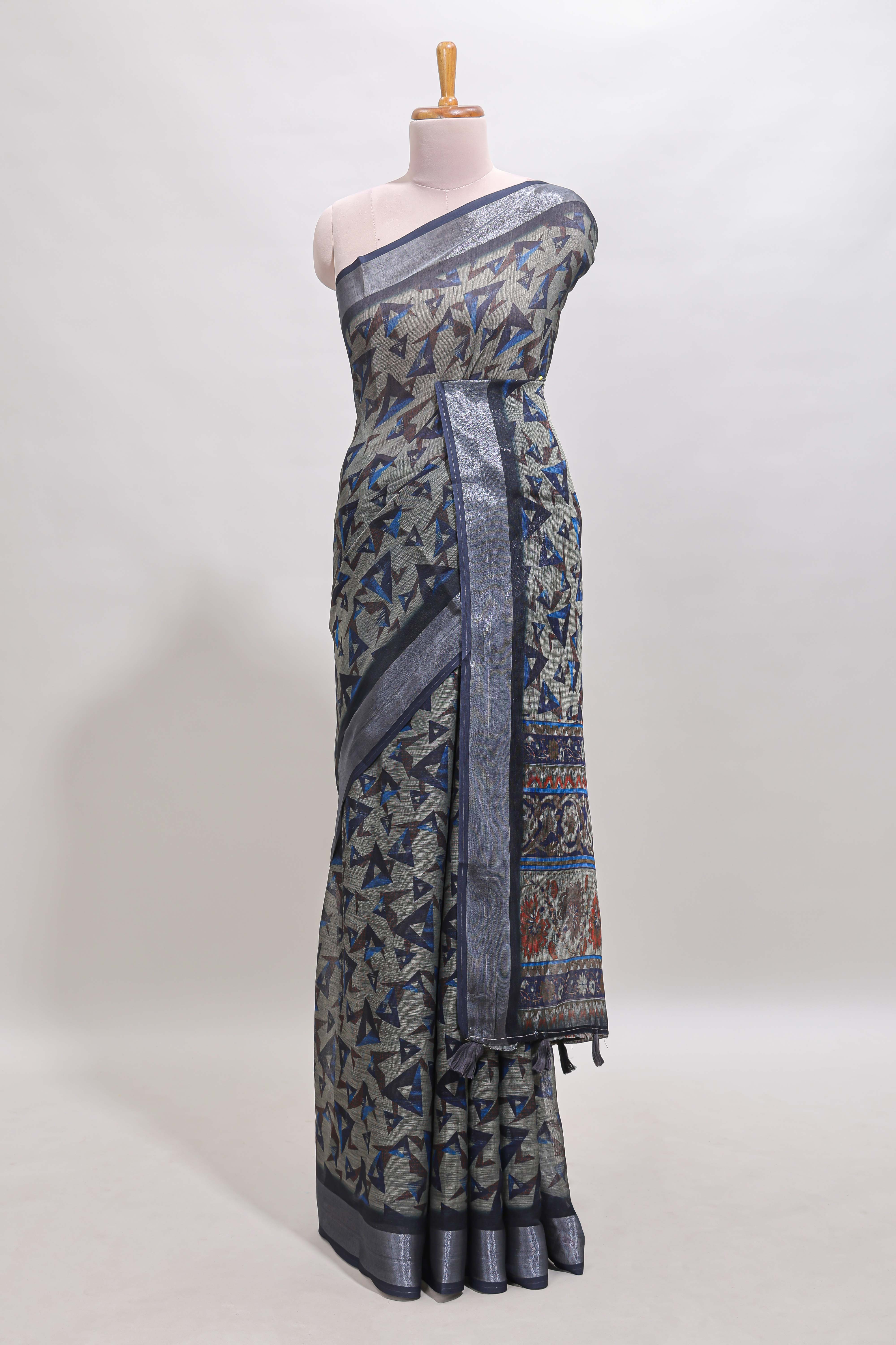Dark sea green geometric design chanderi cotton saree with contrast zari border and printed blouse