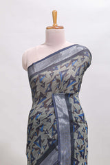 Dark sea green geometric design chanderi cotton saree with contrast zari border and printed blouse