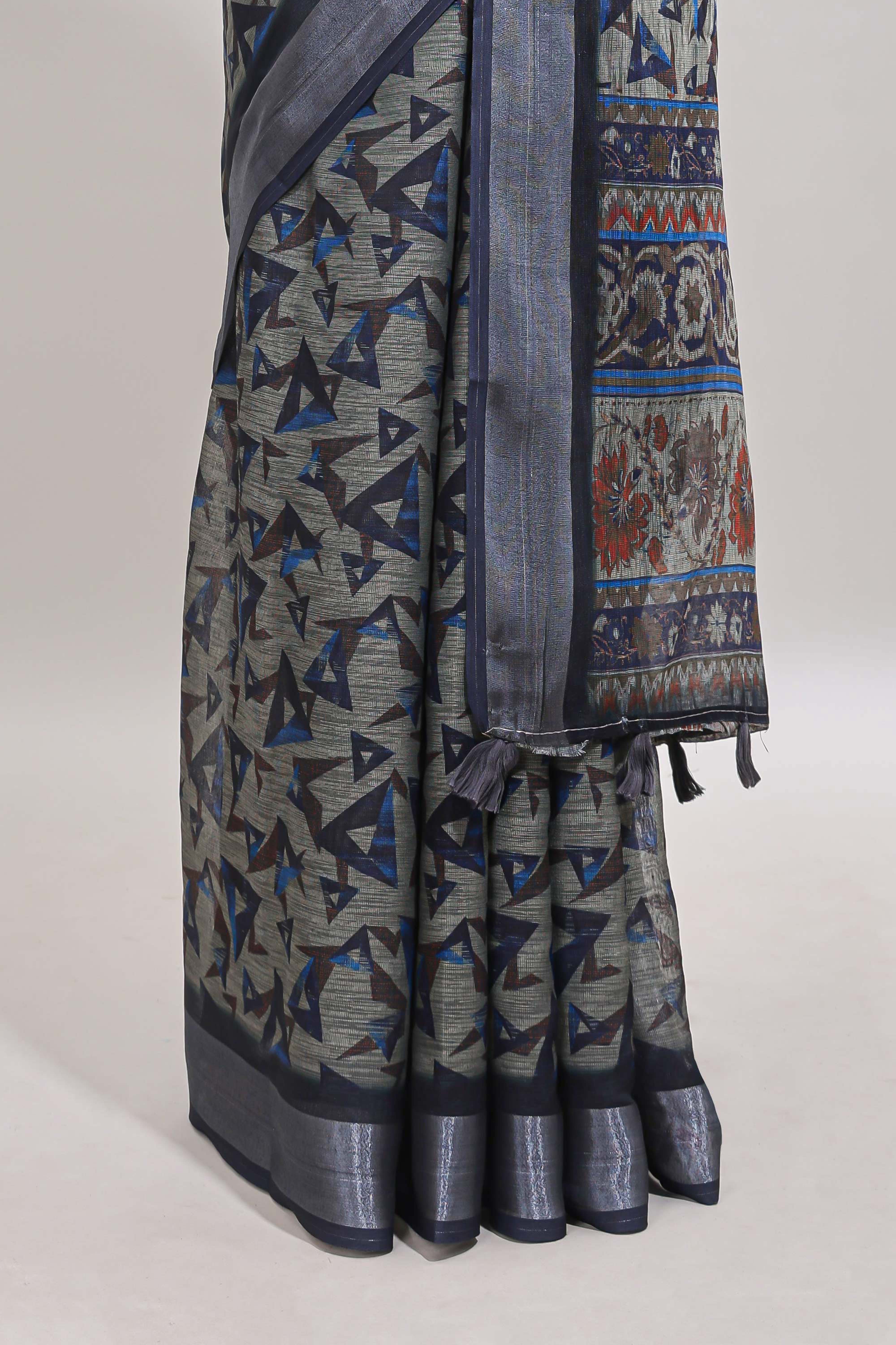 Dark sea green geometric design chanderi cotton saree with contrast zari border and printed blouse