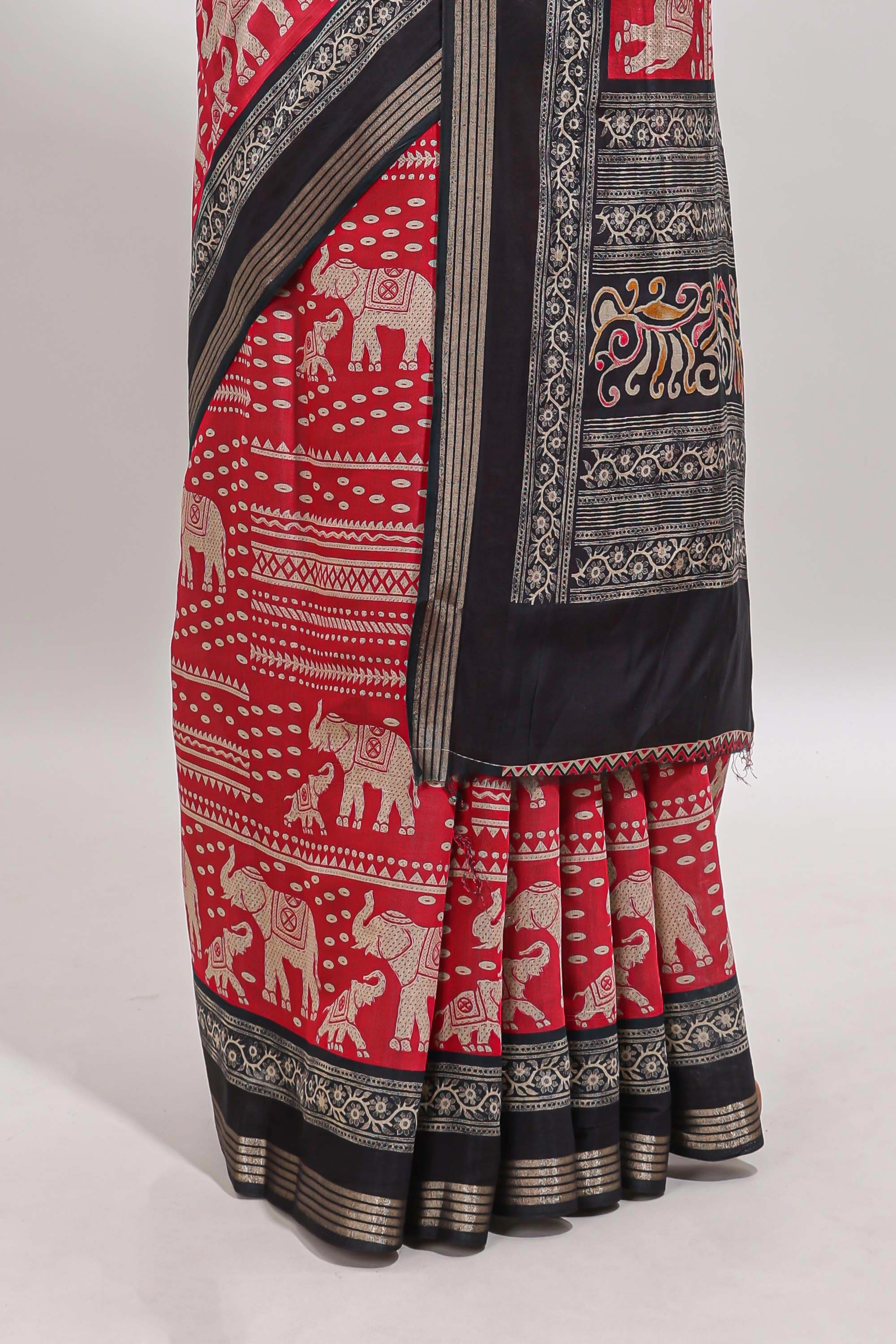 Red geometric & elephant motif chanderi cotton saree with contrast border and chevron blouse