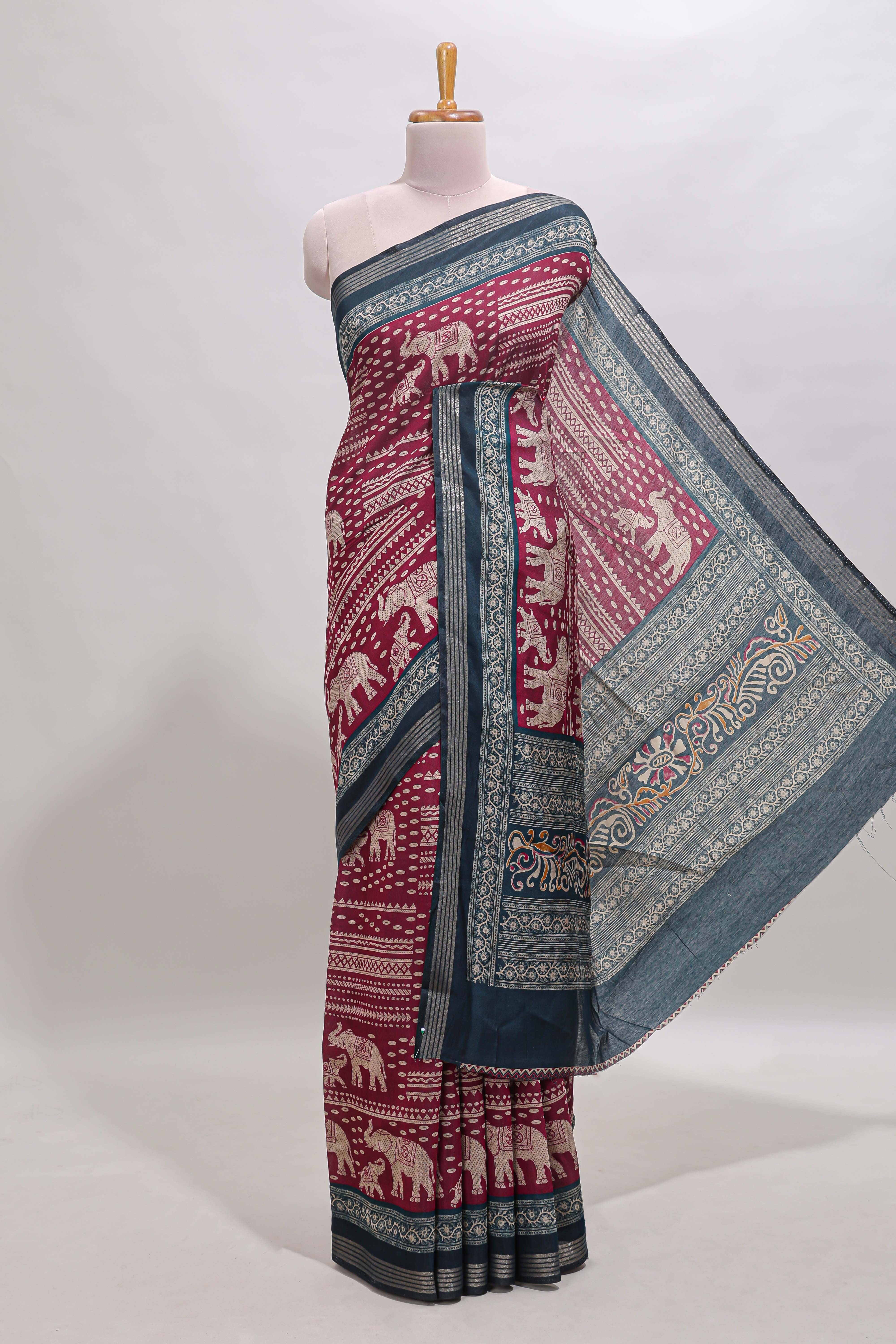 Maroon geometric & elephant motif chanderi cotton saree with contrast border and chevron blouse