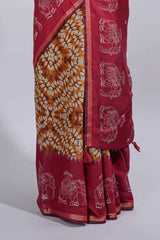 Mustard yellow Chanderi cotton saree with elephant motifs tie and dye effect patterns and contrast zari border along with printed blouse