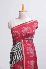 Black Chanderi cotton saree with elephant motifs tie and dye effect patterns and contrast zari border along with printed blouse