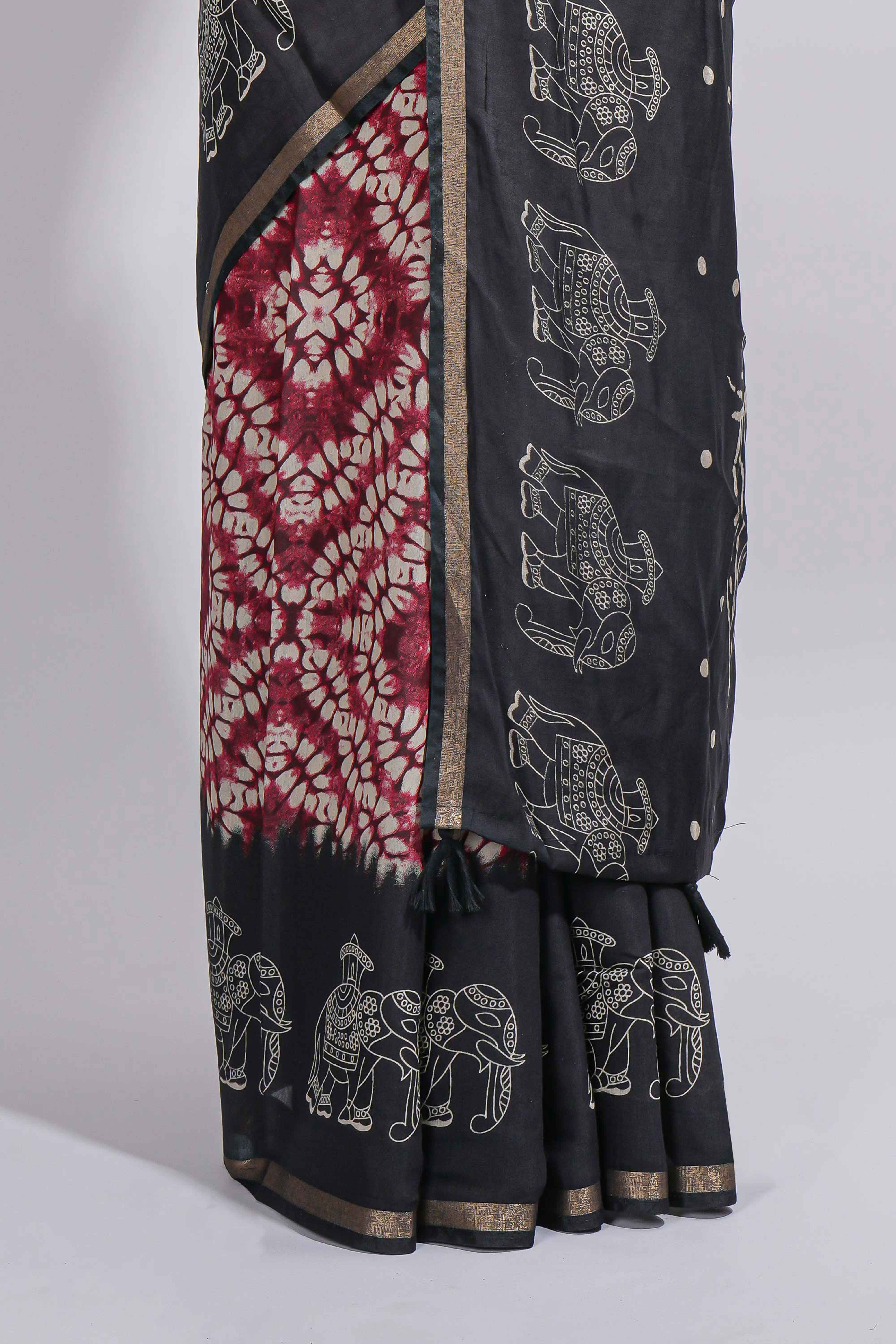 Maroon Chanderi cotton saree with elephant motifs tie and dye effect patterns and contrast zari border along with printed blouse