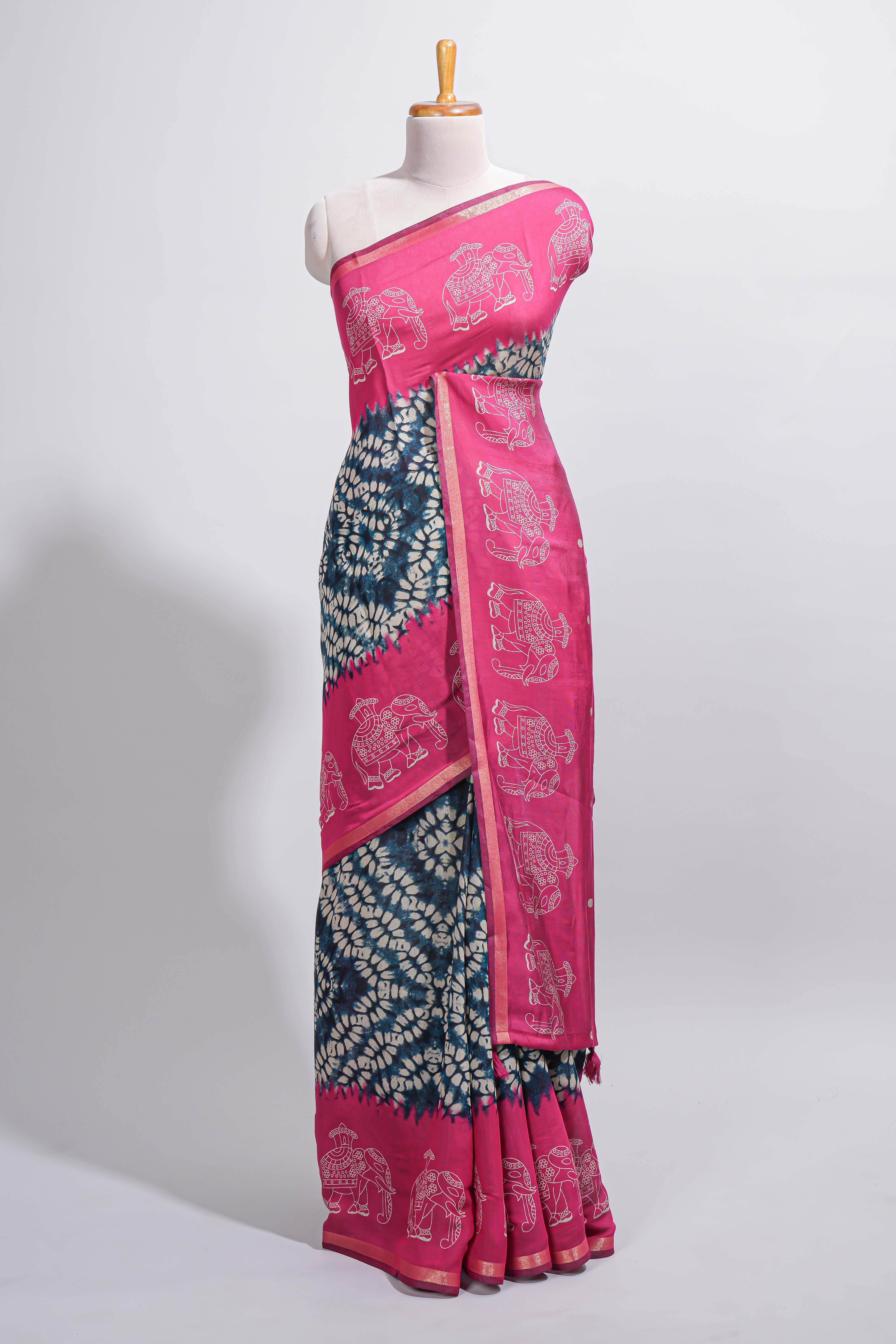 Blue Chanderi cotton saree with elephant motifs tie and dye effect patterns and contrast zari border along with printed blouse