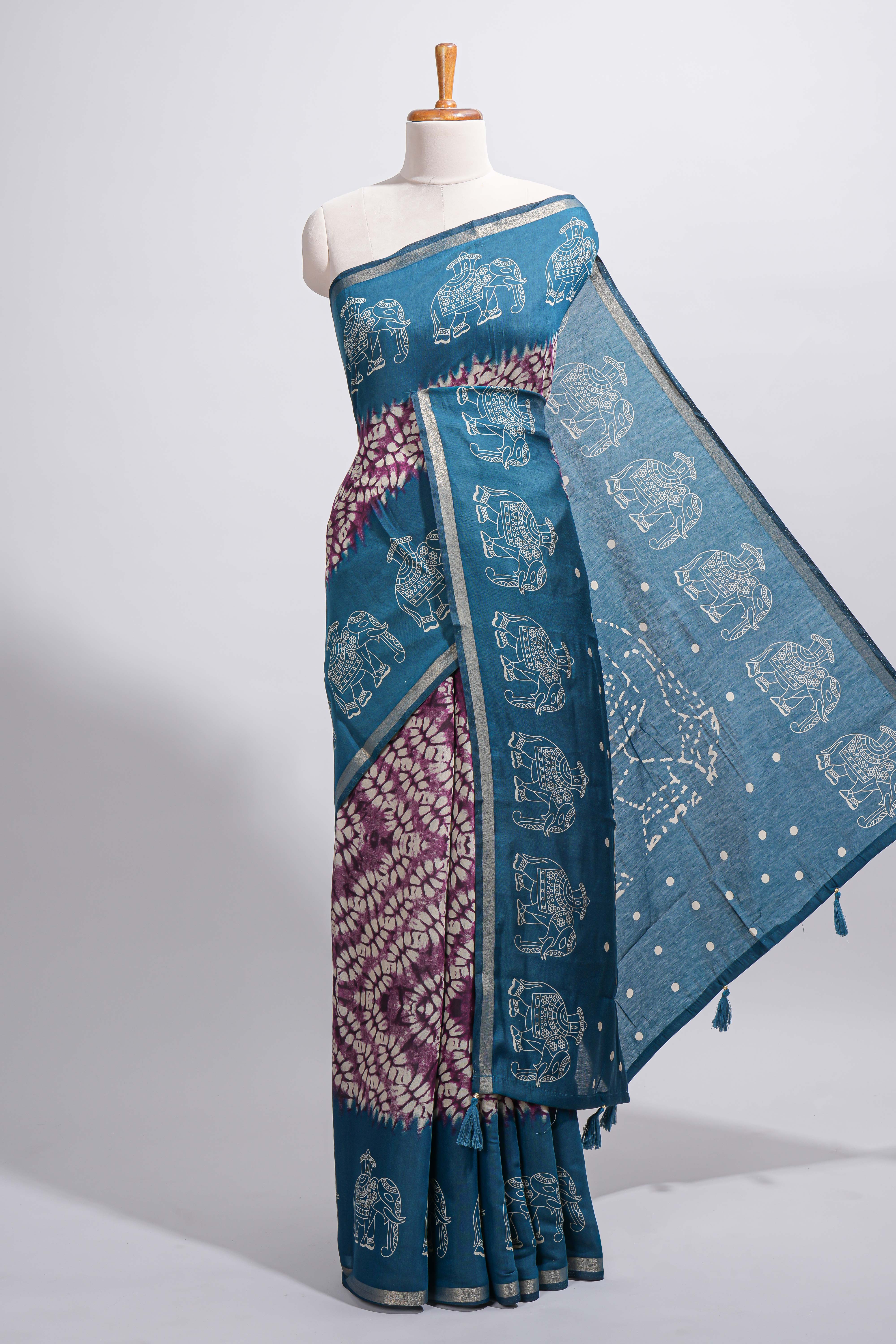Purple Chanderi cotton saree with elephant motifs tie and dye effect patterns and contrast zari border along with printed blouse