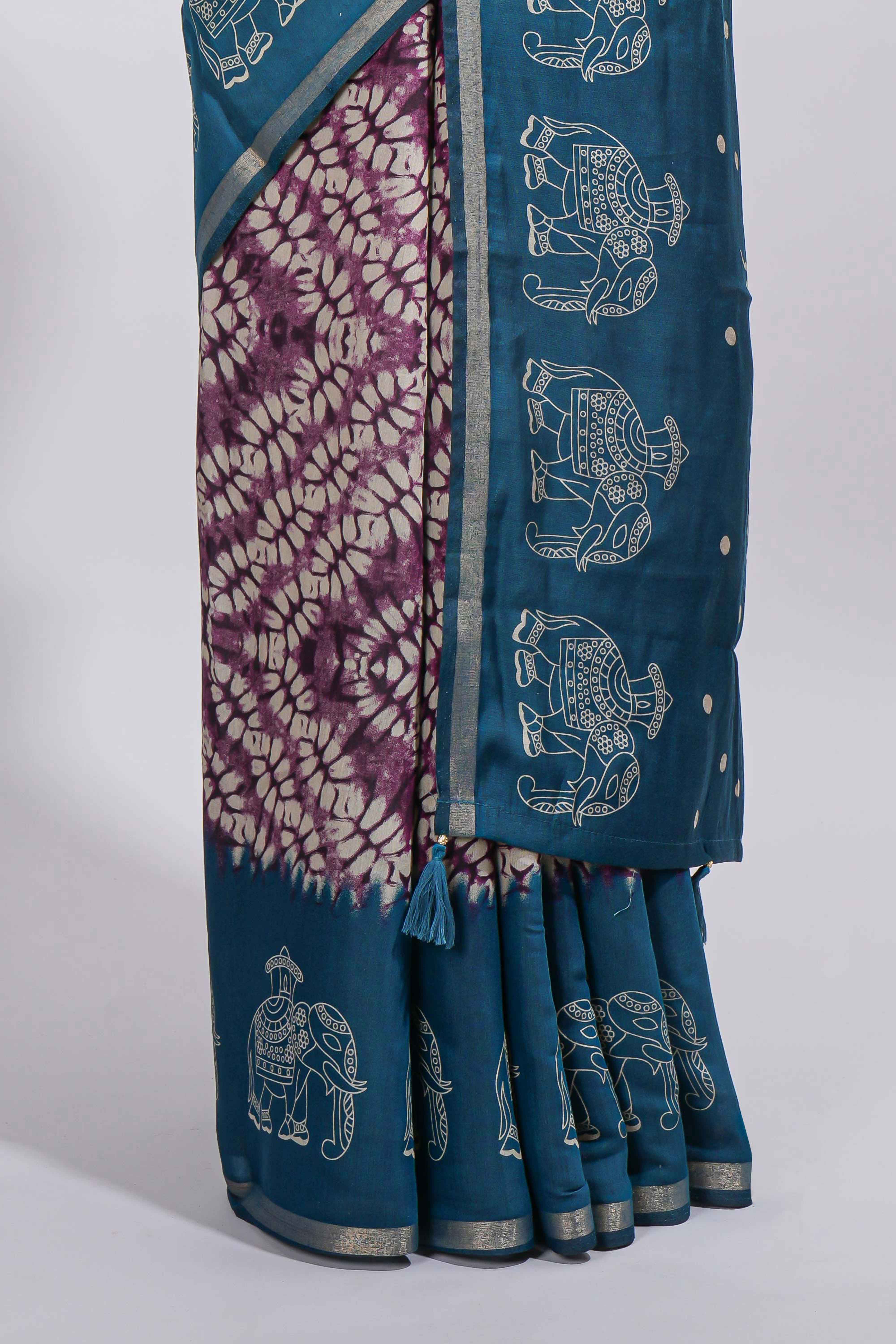 Purple Chanderi cotton saree with elephant motifs tie and dye effect patterns and contrast zari border along with printed blouse