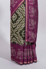 Dark green Chanderi cotton saree with elephant motifs tie and dye effect patterns and contrast zari border along with printed blouse