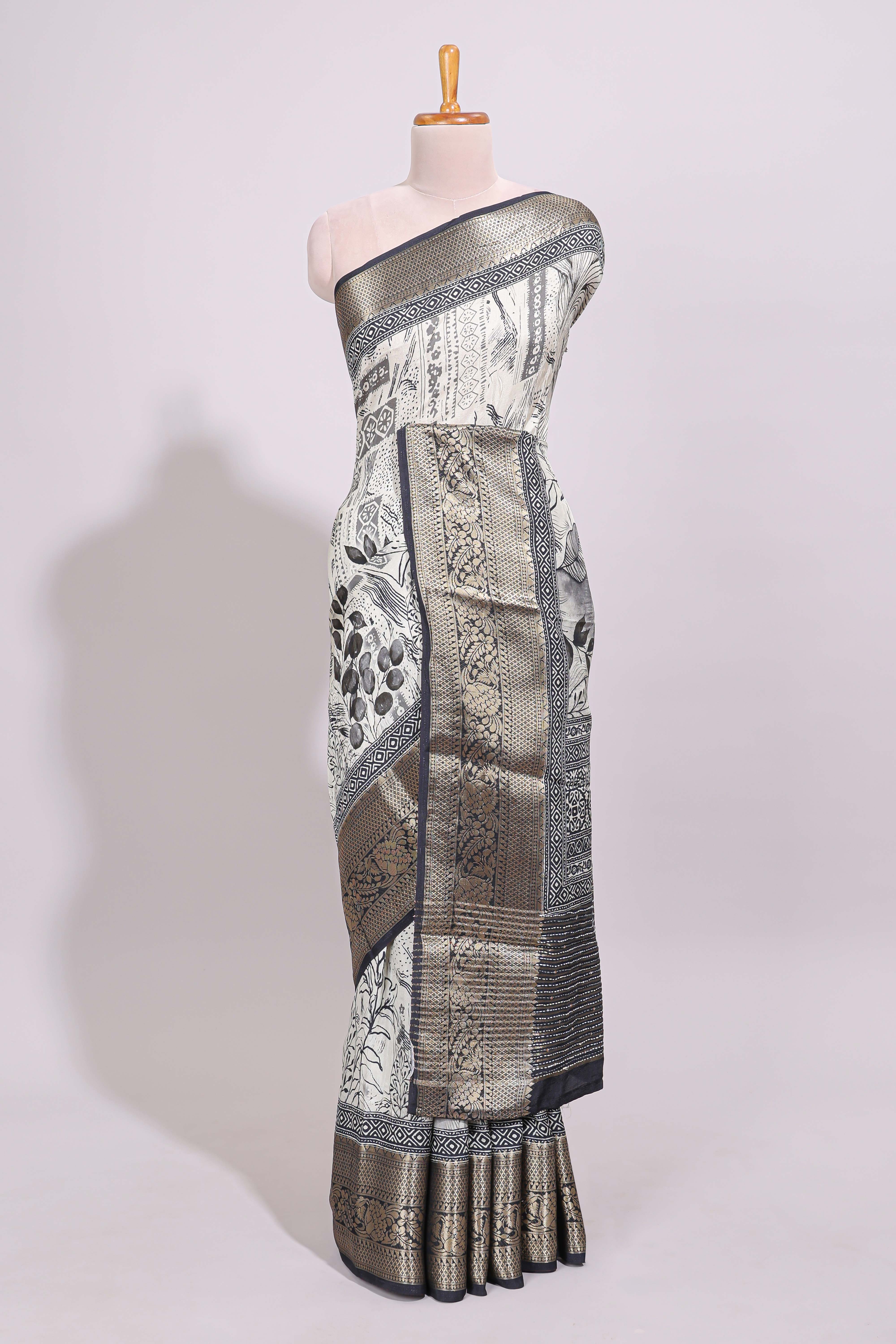 Cream floral design Chanderi cotton saree with contrast zari border and zari motifs blouse