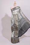 Cream floral design Chanderi cotton saree with contrast zari border and zari motifs blouse