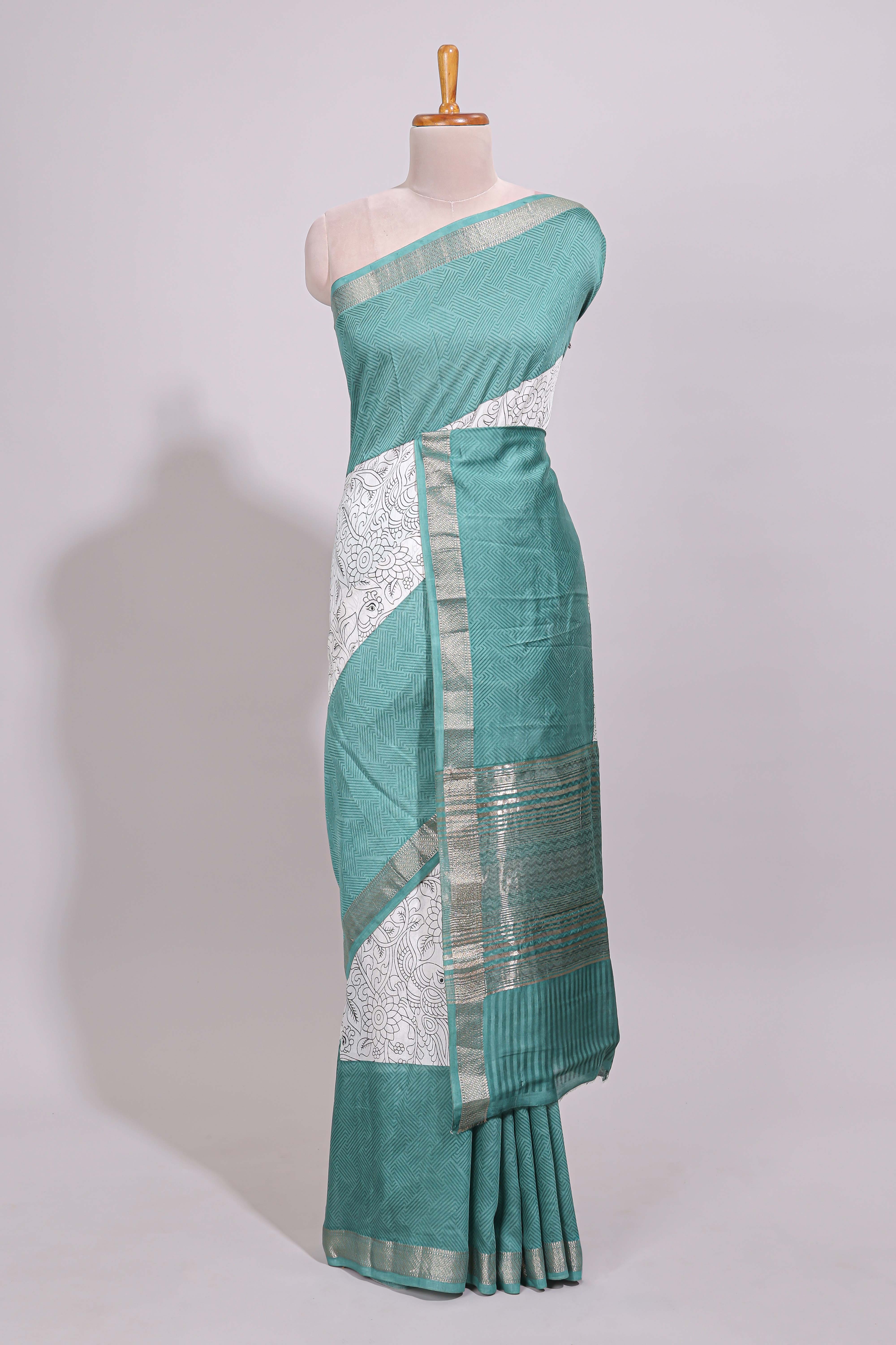 White floral design Chanderi cotton saree with contrast turquoise green zari border and floral print blouse