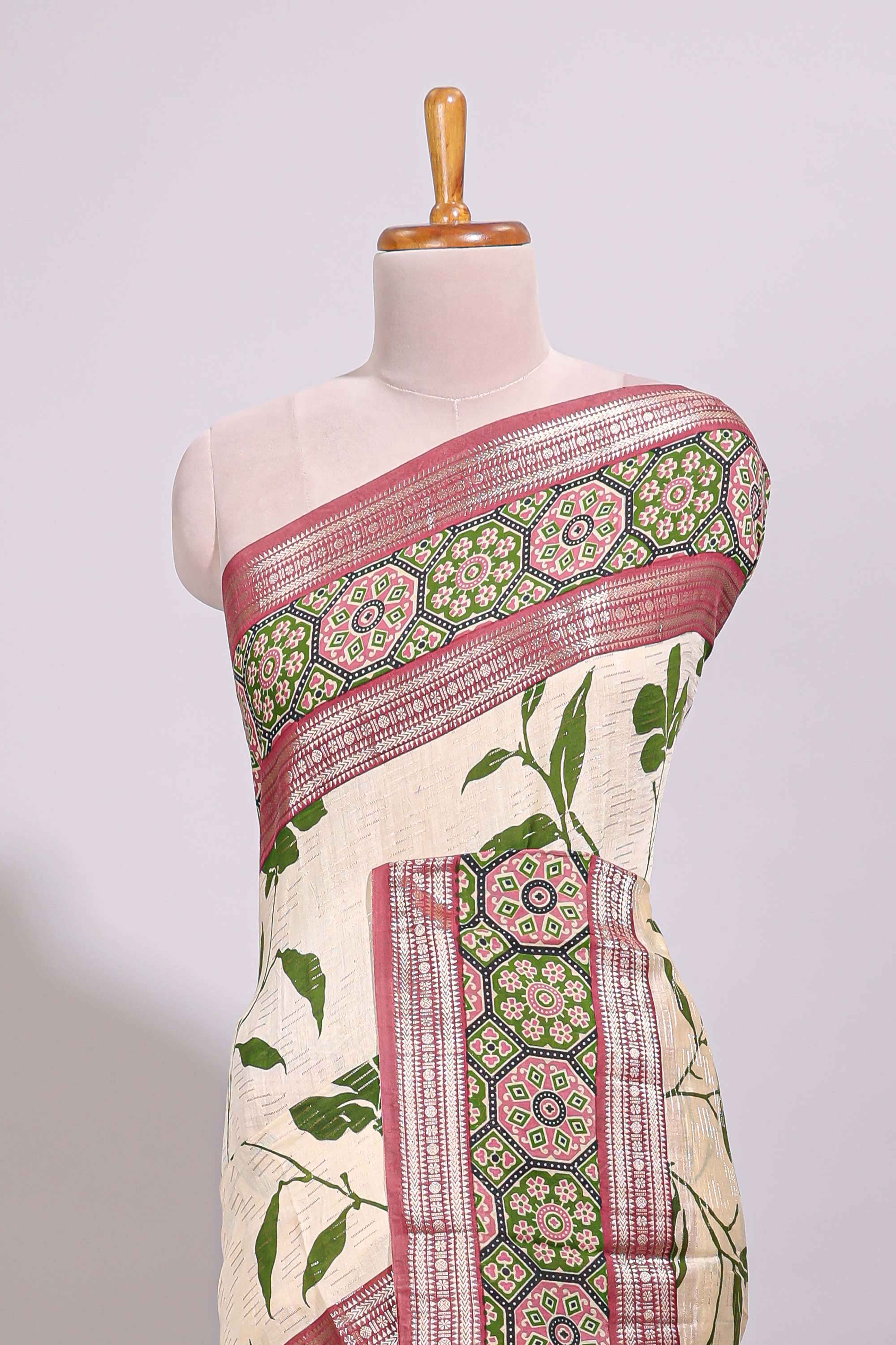Cream leaf design chanderi cotton saree with contrast bentex zari border andprinted blouse