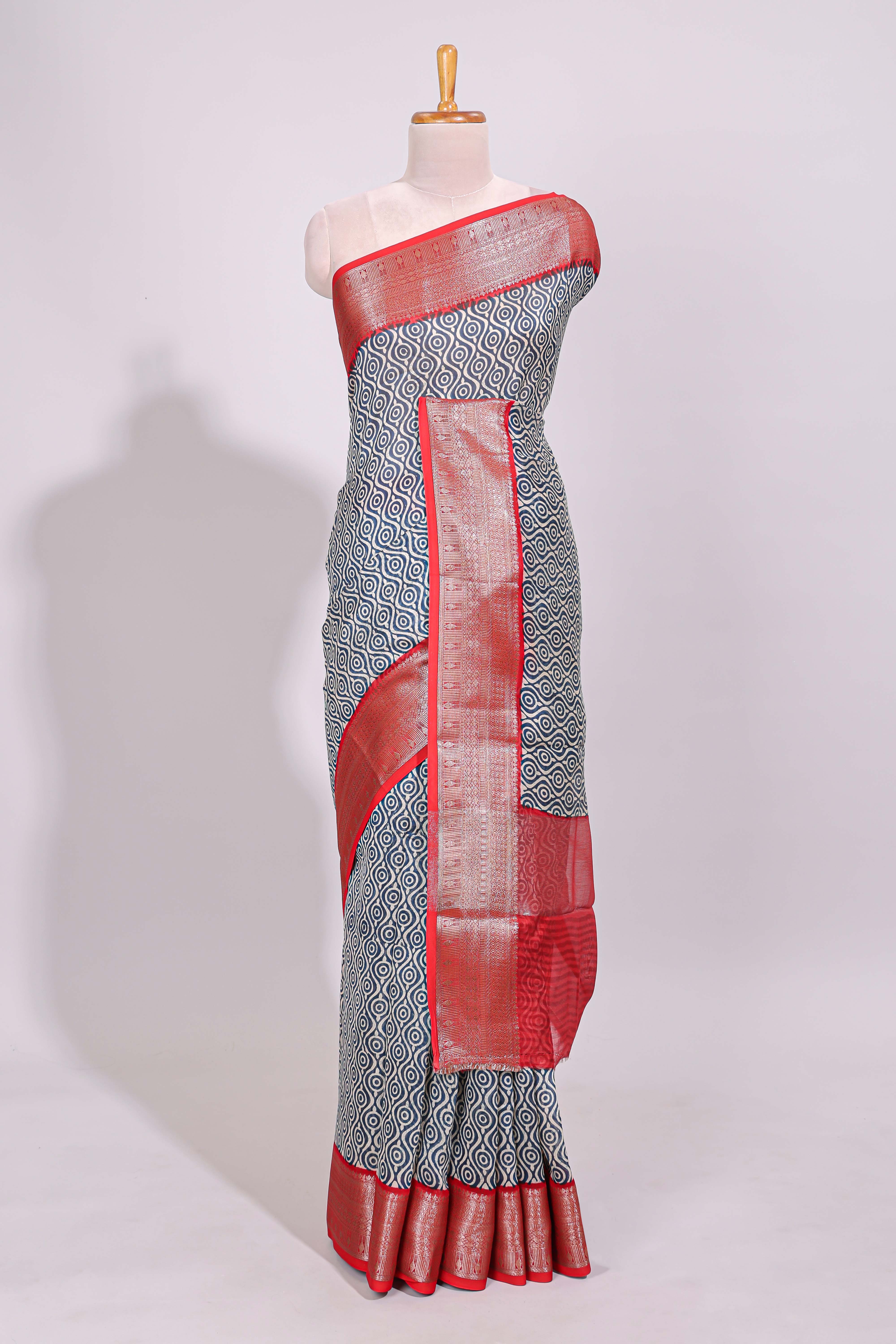 Cream geometric print design chanderi cotton saree with contrast border and striped blouse