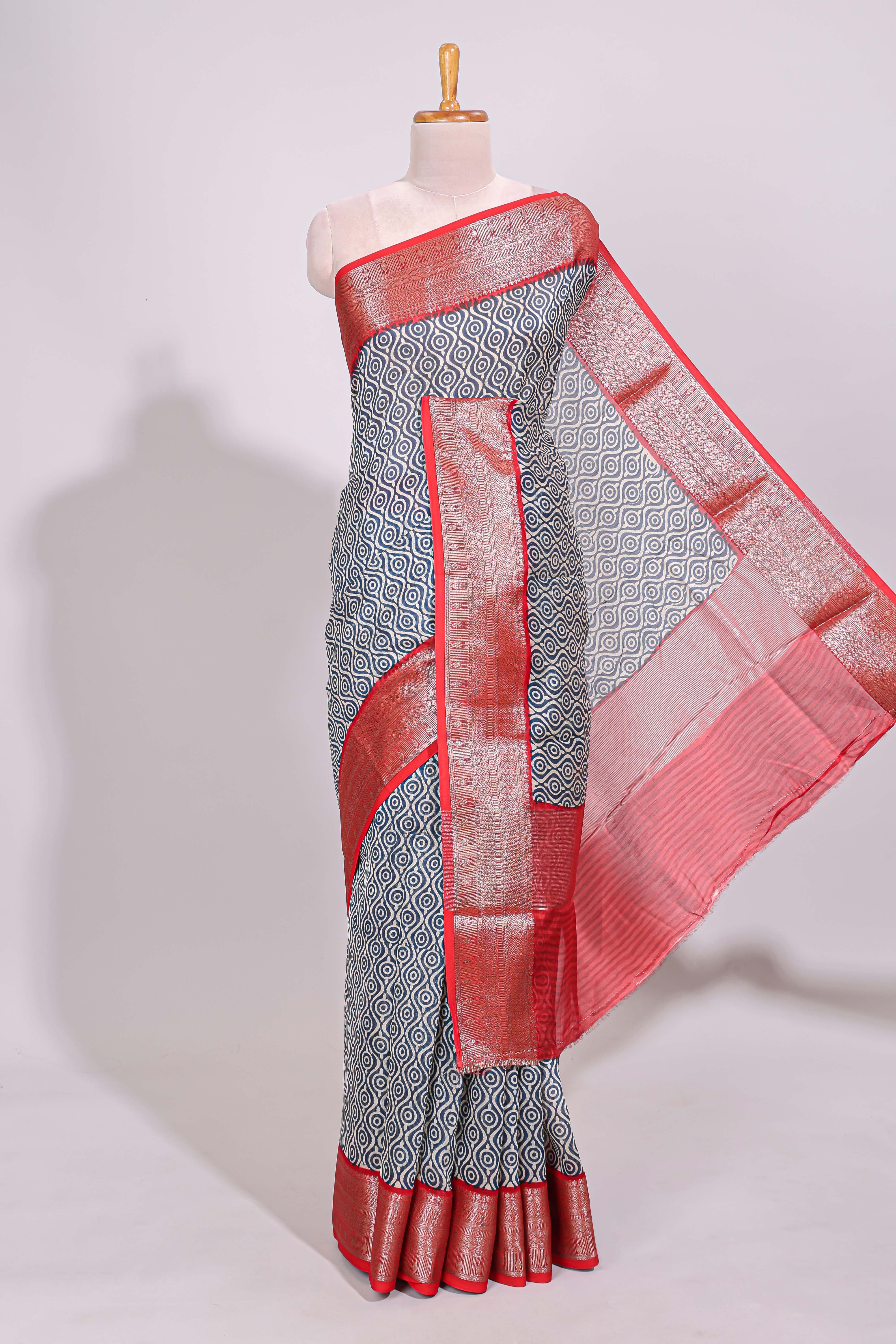 Cream geometric print design chanderi cotton saree with contrast border and striped blouse