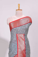 Cream geometric print design chanderi cotton saree with contrast border and striped blouse