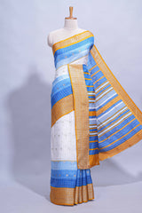 White and blue Dola Silk Saree with rich zari border woven butis and a designer pallu along with contrast blouse