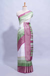 White and green Dola Silk Saree with rich zari border woven butis and a designer pallu along with contrast blouse