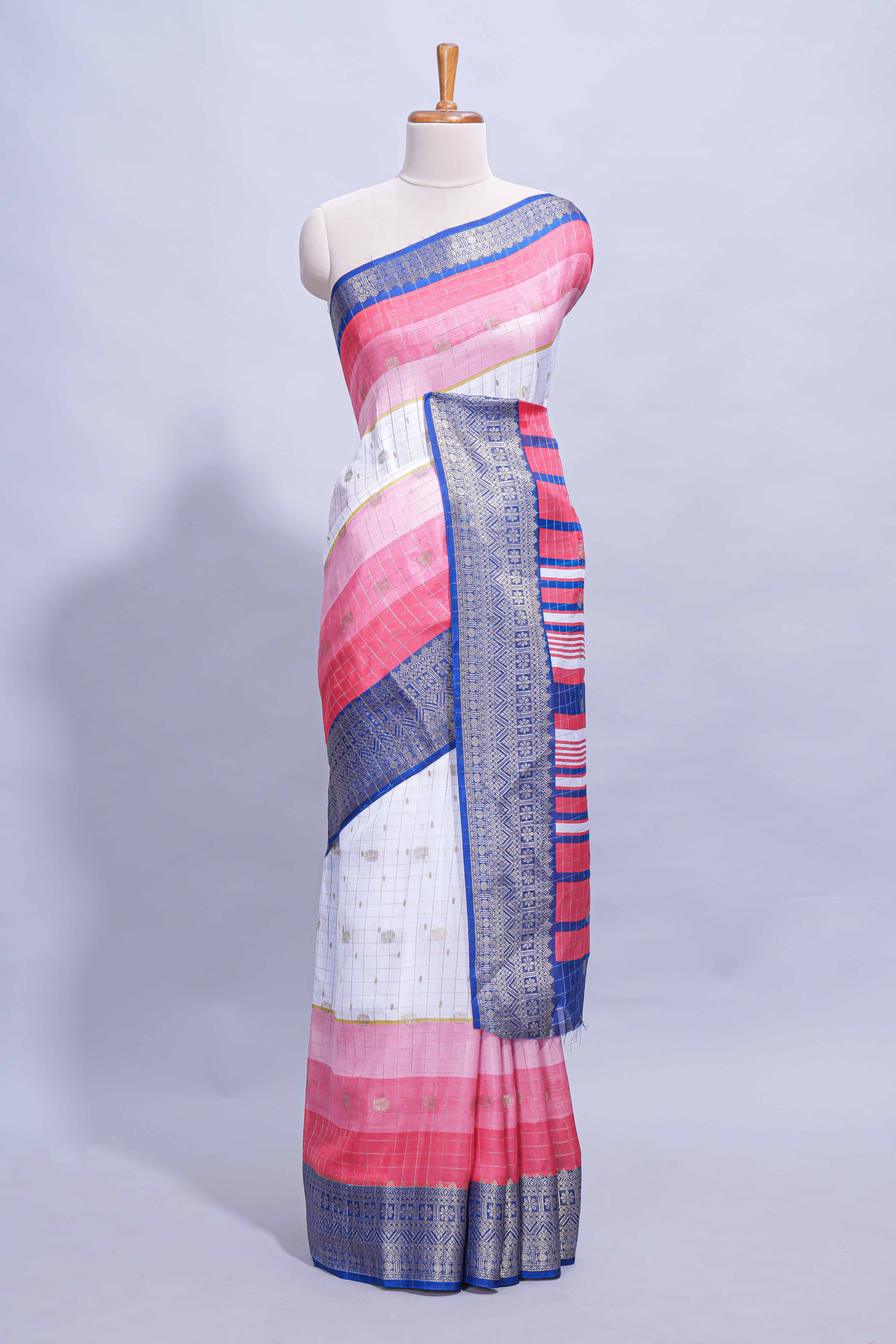 White and pink Dola Silk Saree with rich zari border woven butis and a designer pallu along with contrast blouse