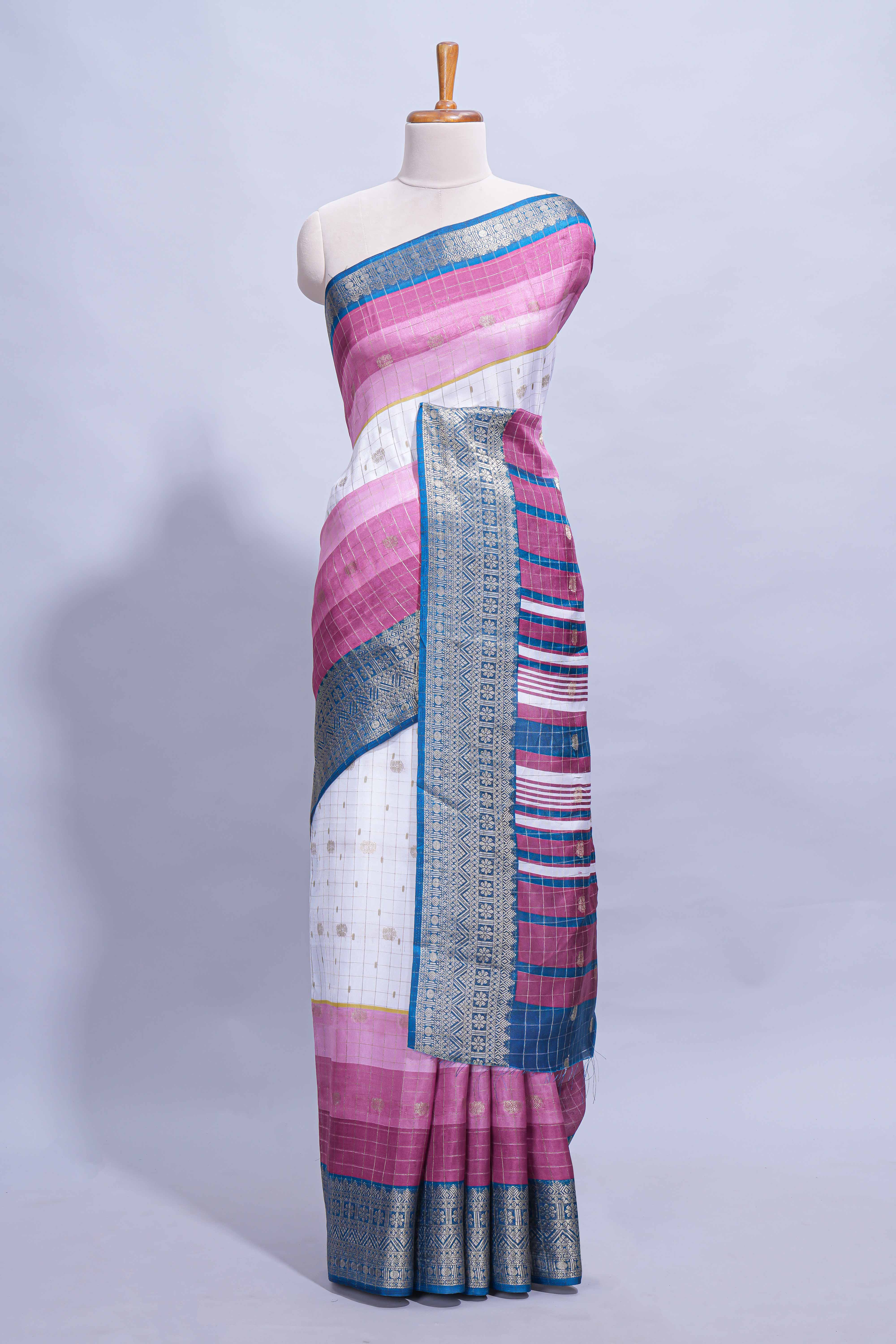 White and violet Dola Silk Saree with rich zari border woven butis and a designer pallu along with contrast blouse