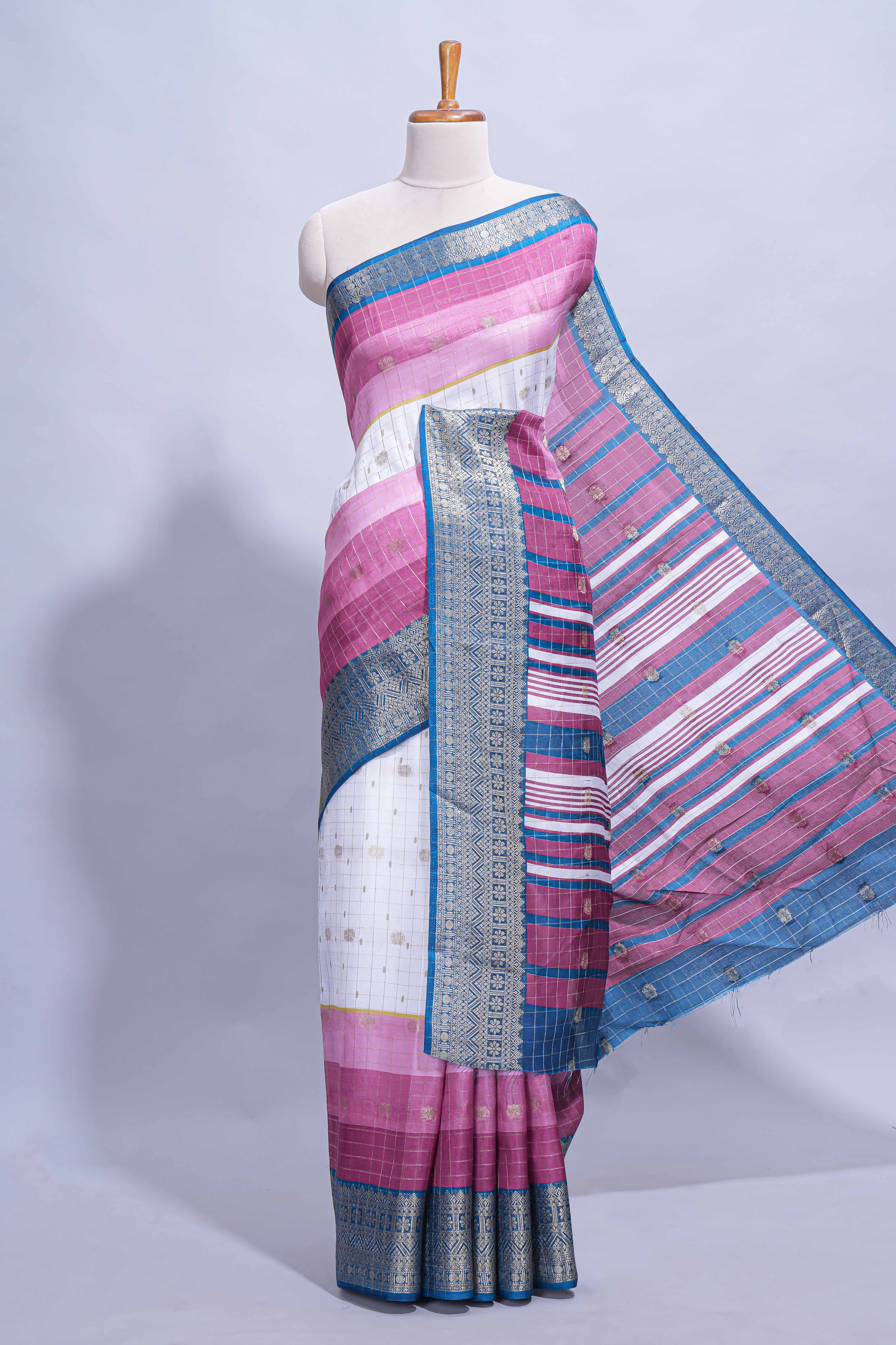 White and violet Dola Silk Saree with rich zari border woven butis and a designer pallu along with contrast blouse