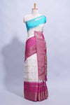 White Dola Silk Saree with aqua blue and magenta zari borders elegant woven checks and a rich designer pallu along with contrast blouse