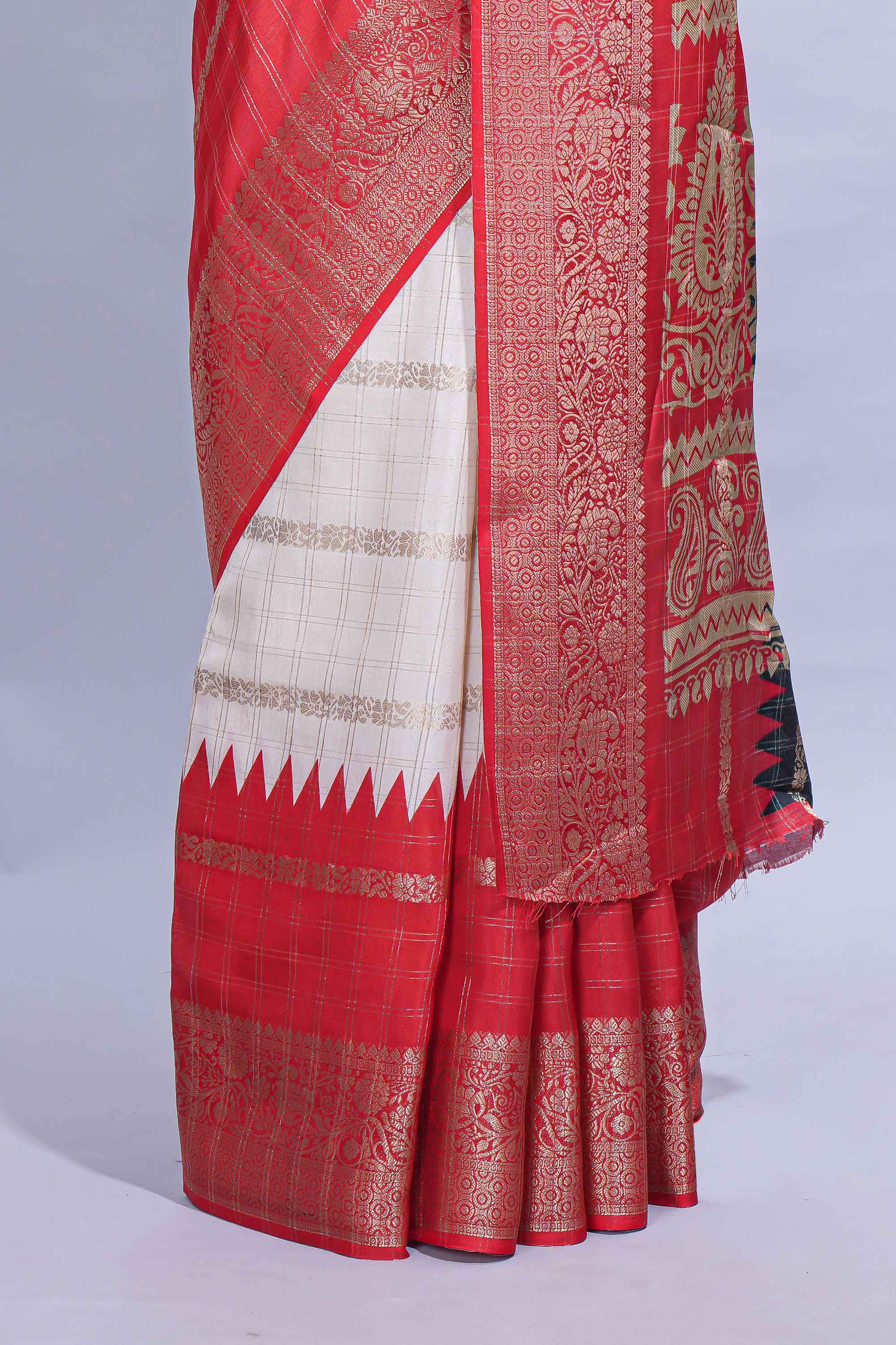 White Dola Silk Saree with red and black zari borders elegant woven checks and a rich designer pallu along with contrast blouse