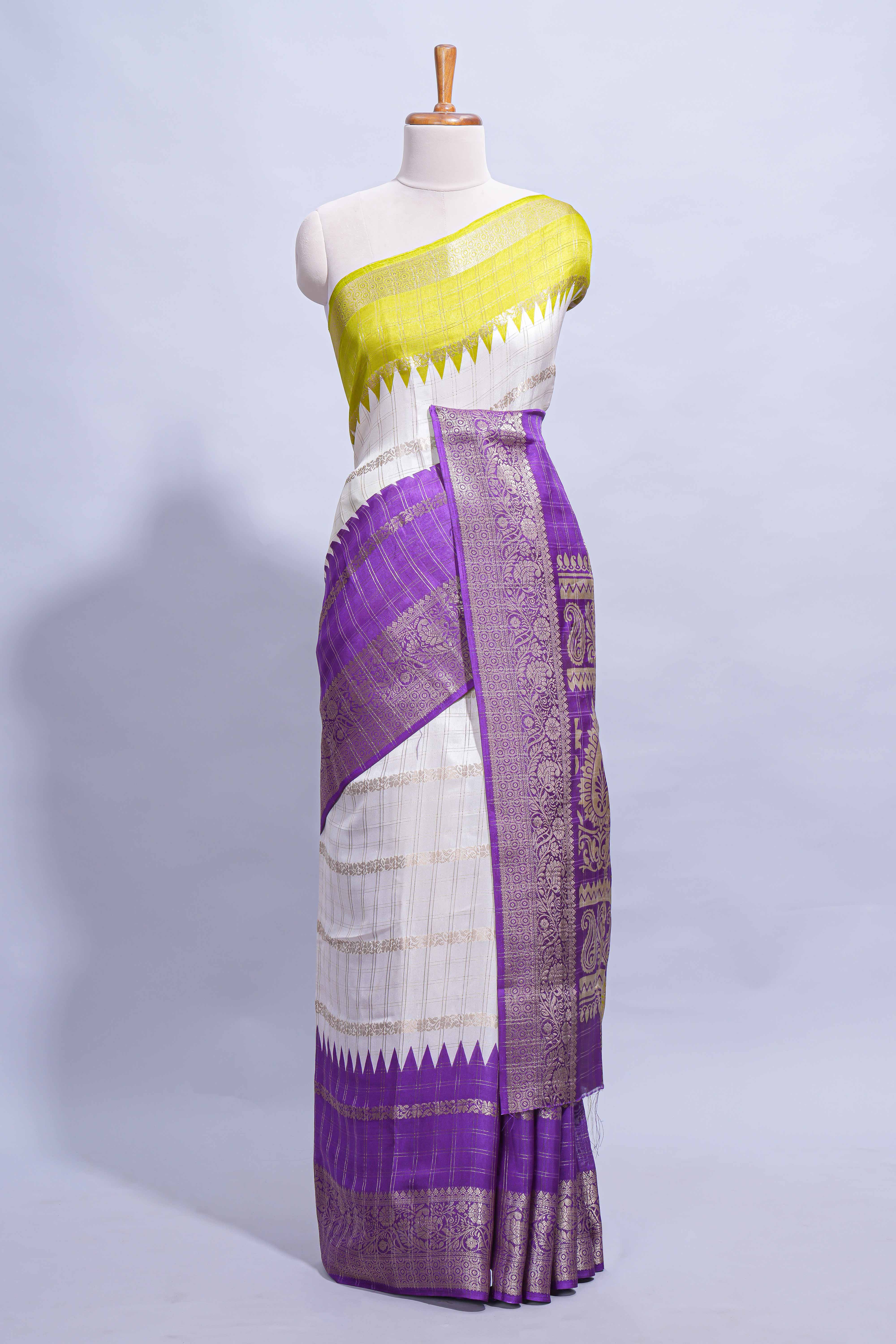 White Dola Silk Saree with violet and green zari borders elegant woven checks and a rich designer pallu along with contrast blouse