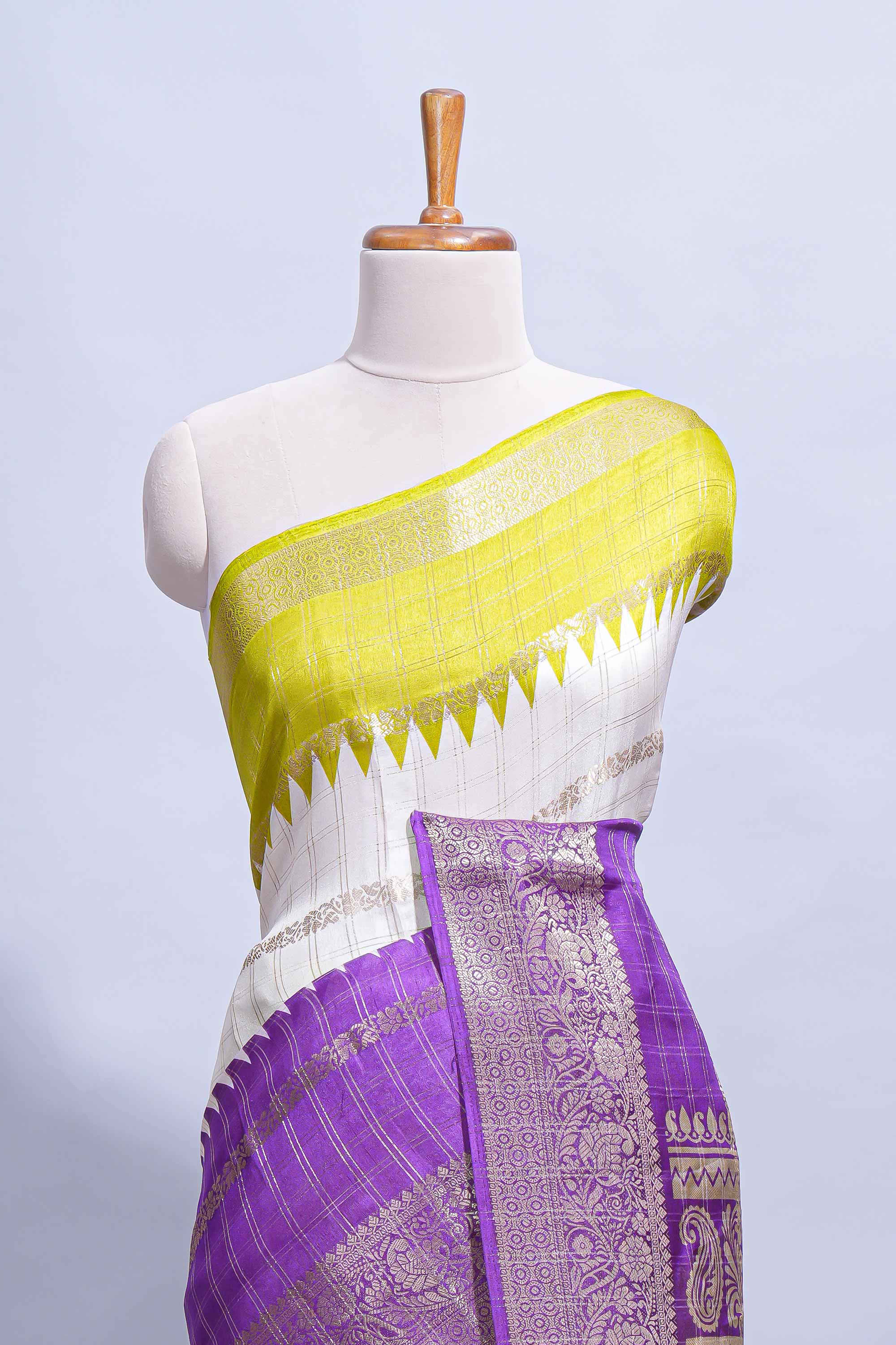 White Dola Silk Saree with violet and green zari borders elegant woven checks and a rich designer pallu along with contrast blouse