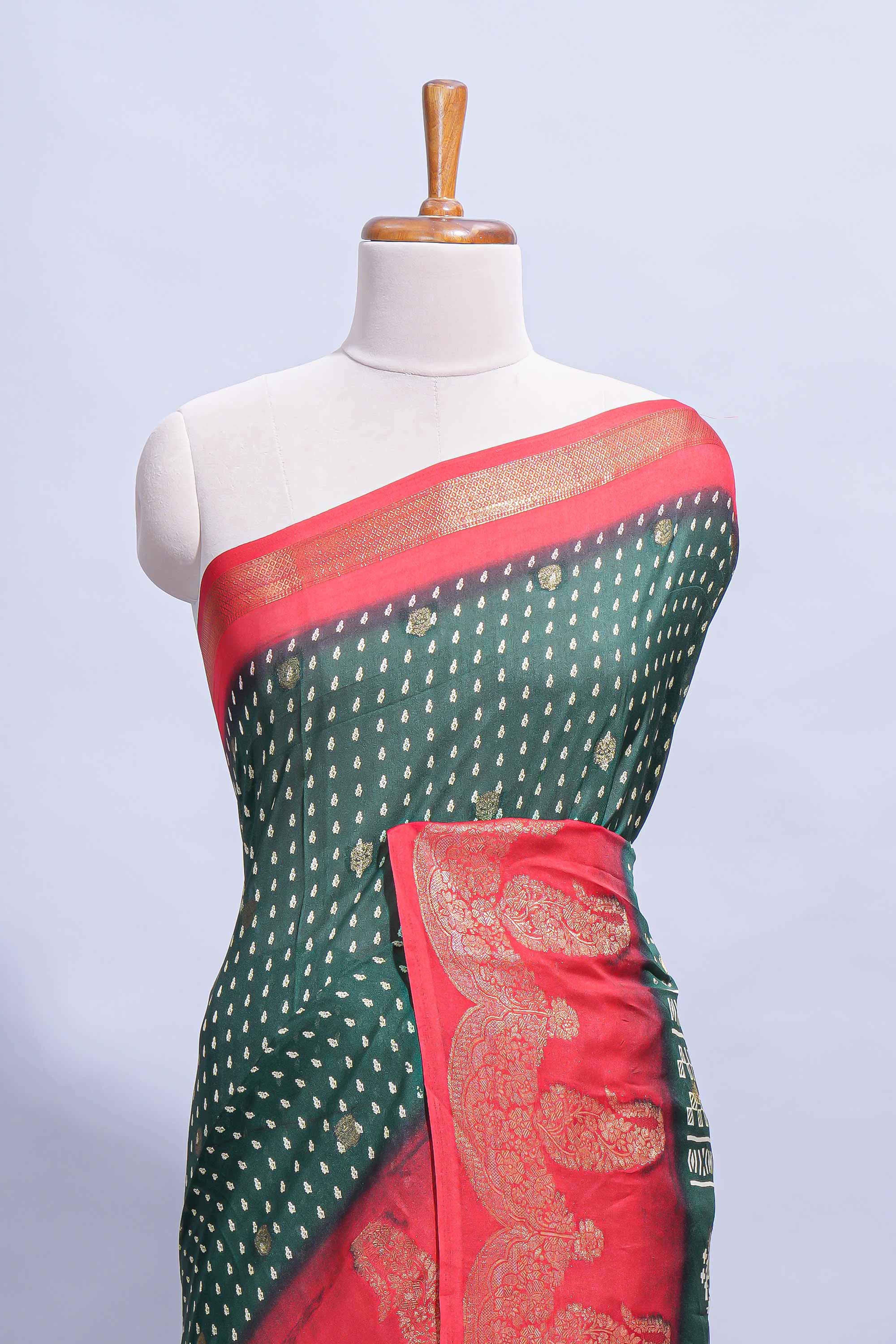 Dark Green Dola Silk Saree with elegant zari butis a rich zari border woven designer pallu along with matcing blouse