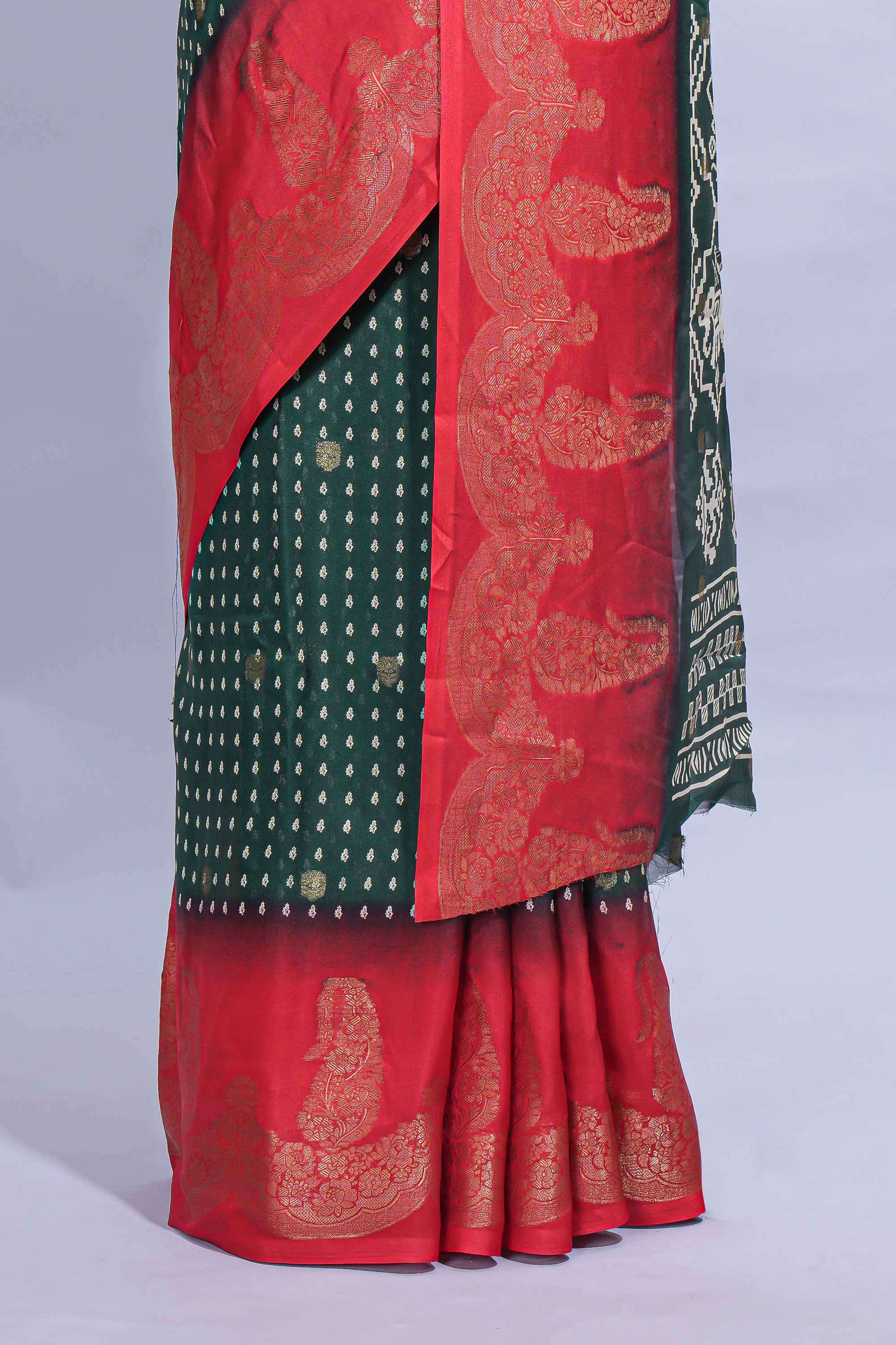 Dark Green Dola Silk Saree with elegant zari butis a rich zari border woven designer pallu along with matcing blouse