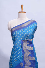Dark blue Dola Silk Saree with elegant zari butis a rich zari border woven designer pallu along with matcing blouse