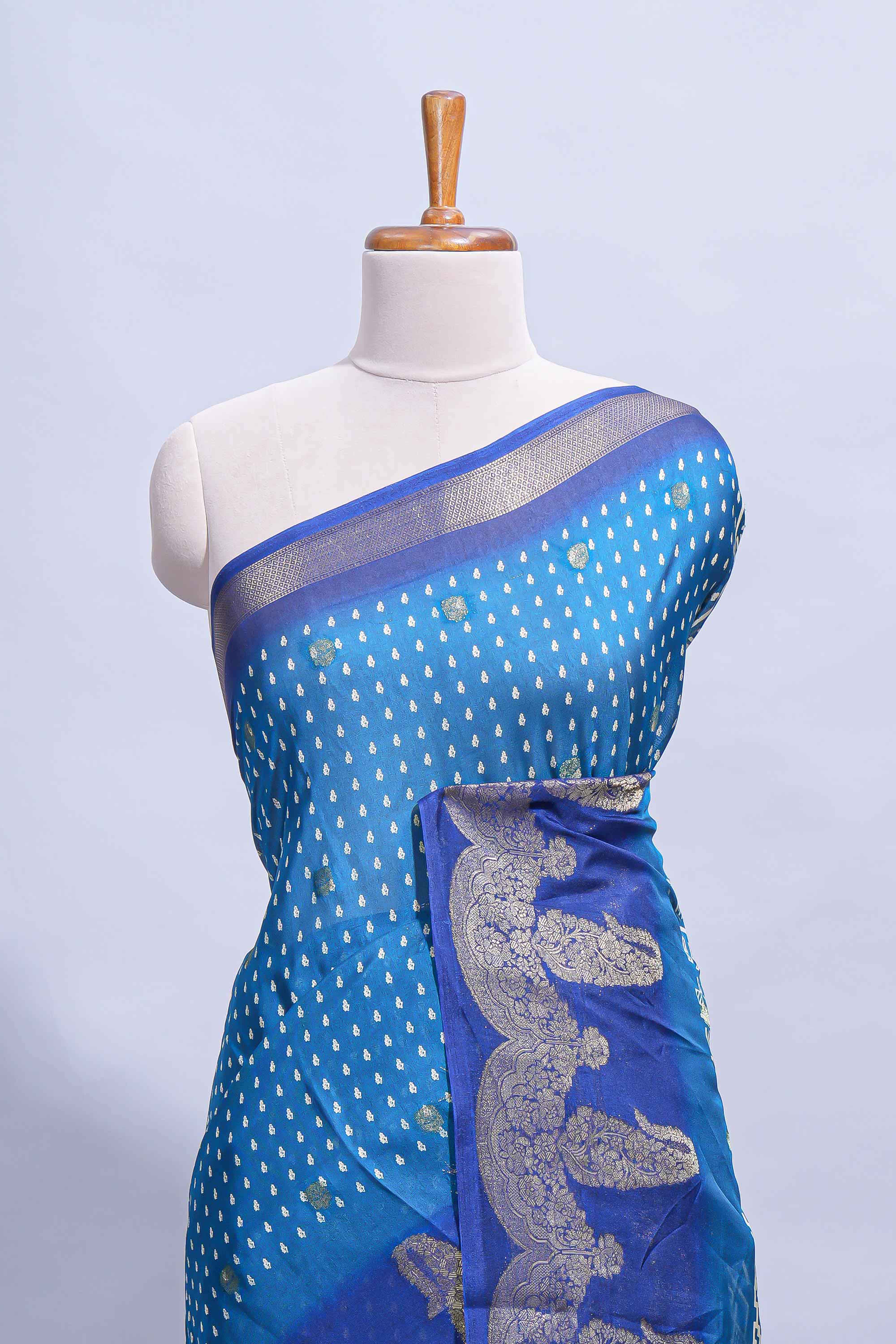 Dark blue Dola Silk Saree with elegant zari butis a rich zari border woven designer pallu along with matcing blouse