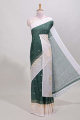 Green striped zari butta dola silk saree with contrast zari border and matching blouse