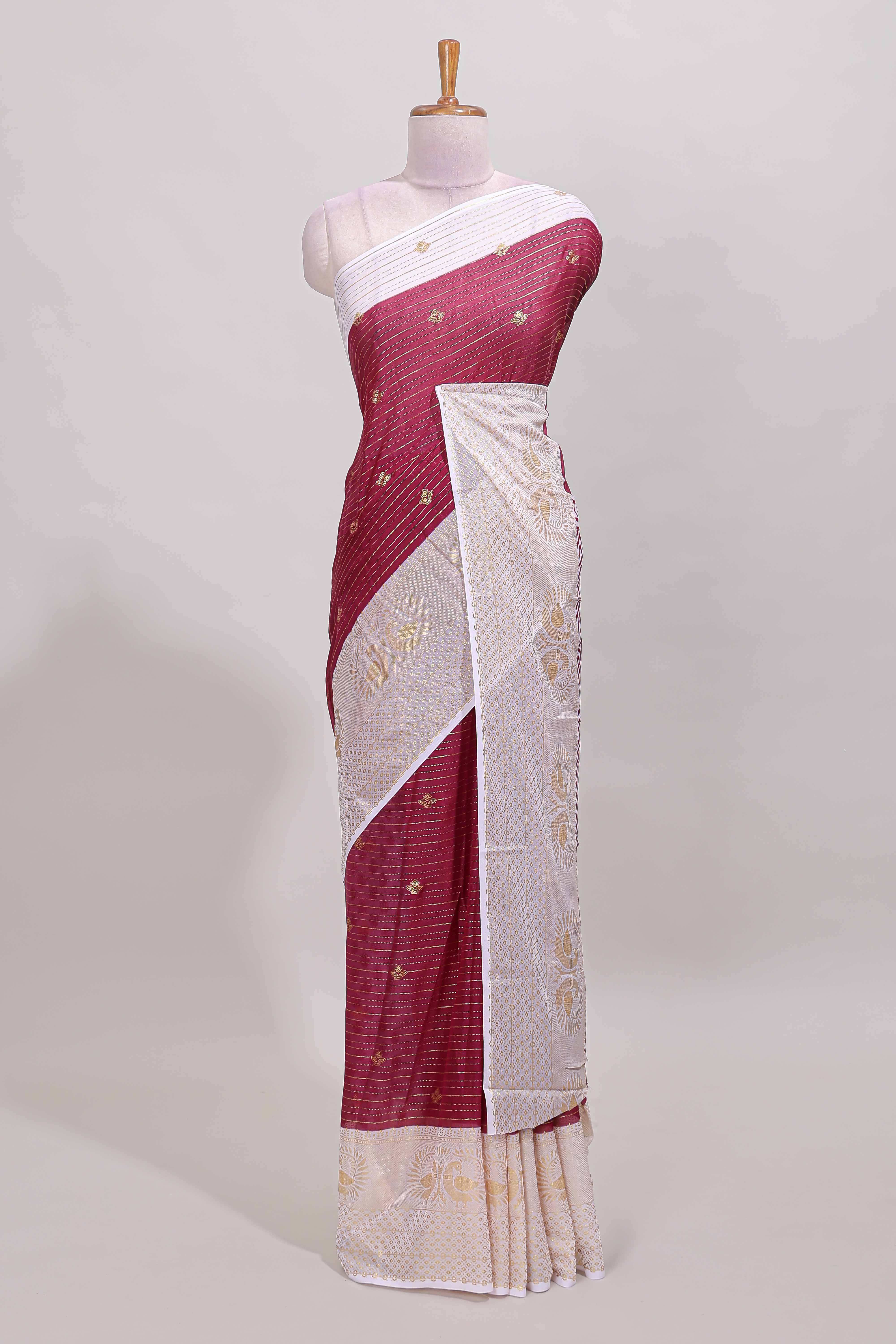 Maroon zari striped dola silk saree with contrast zari border and blouse