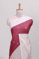 Maroon zari striped dola silk saree with contrast zari border and blouse
