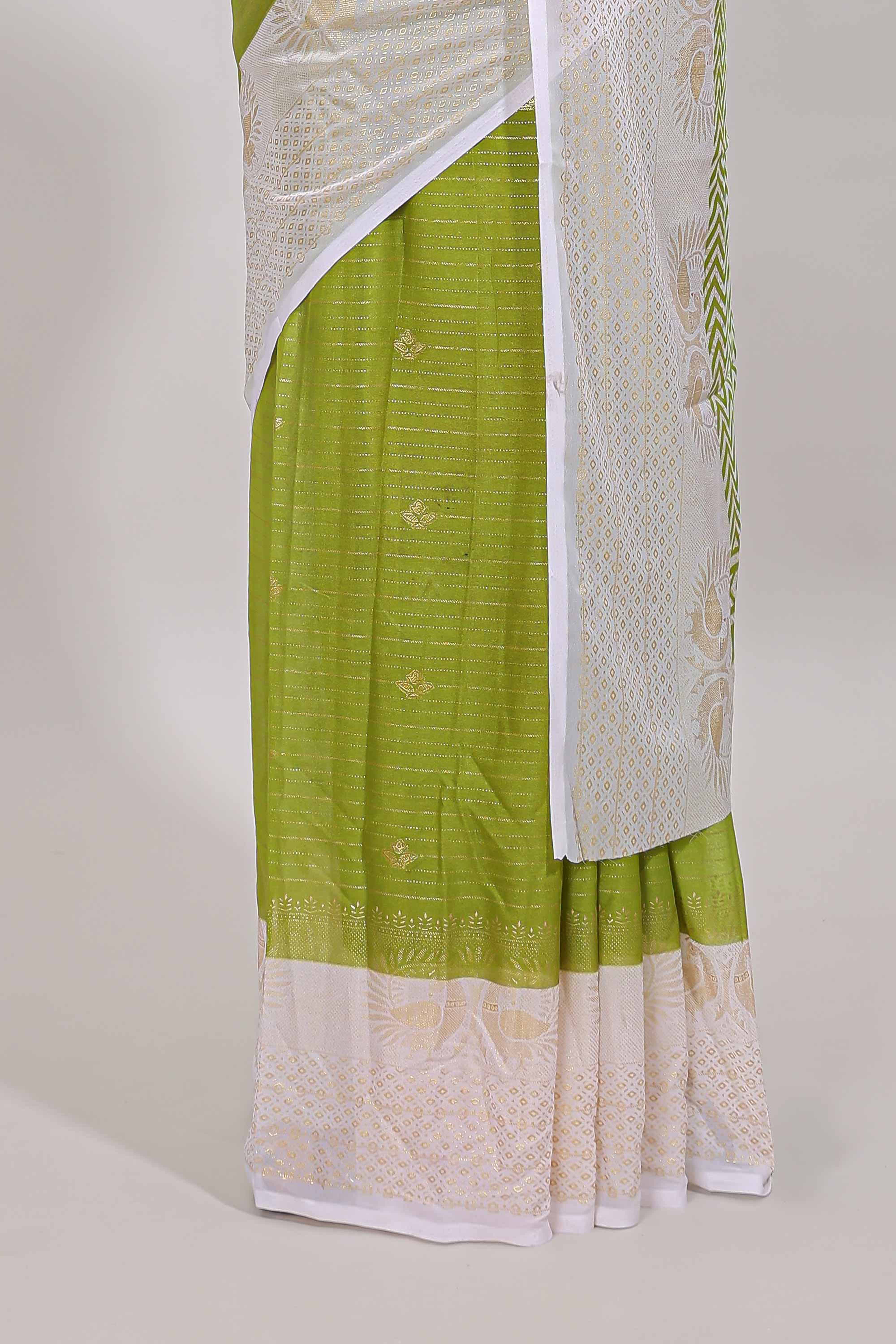 Green zari striped dola silk saree with contrast zari border and blouse