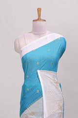 Ice blue zari striped dola silk saree with contrast zari border and blouse