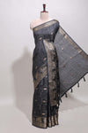 Deep navy blue zari butta dola silk saree with self zari border and printed pallu