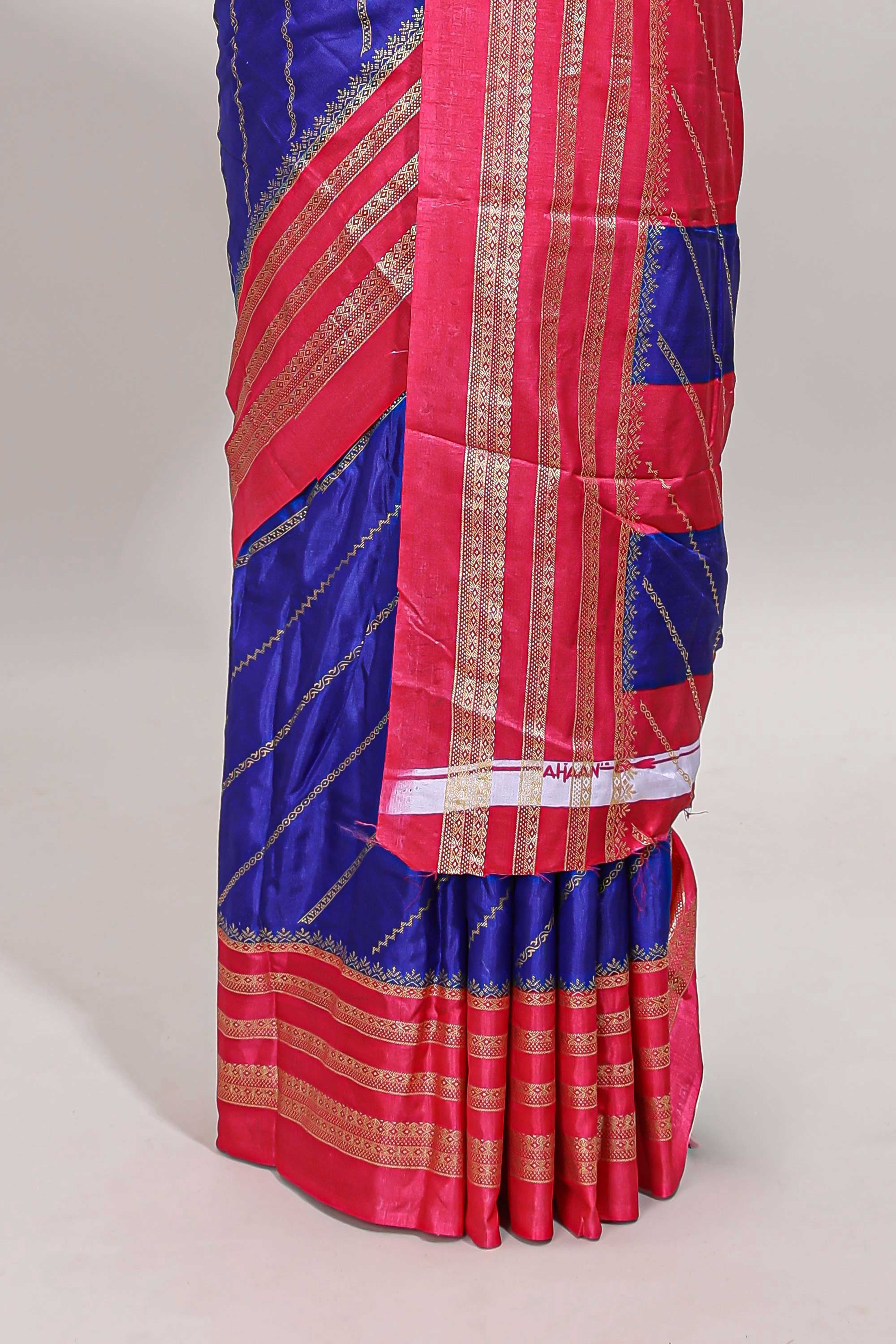 Blue zari striped saree in dola silk with contrast woven border and blouse
