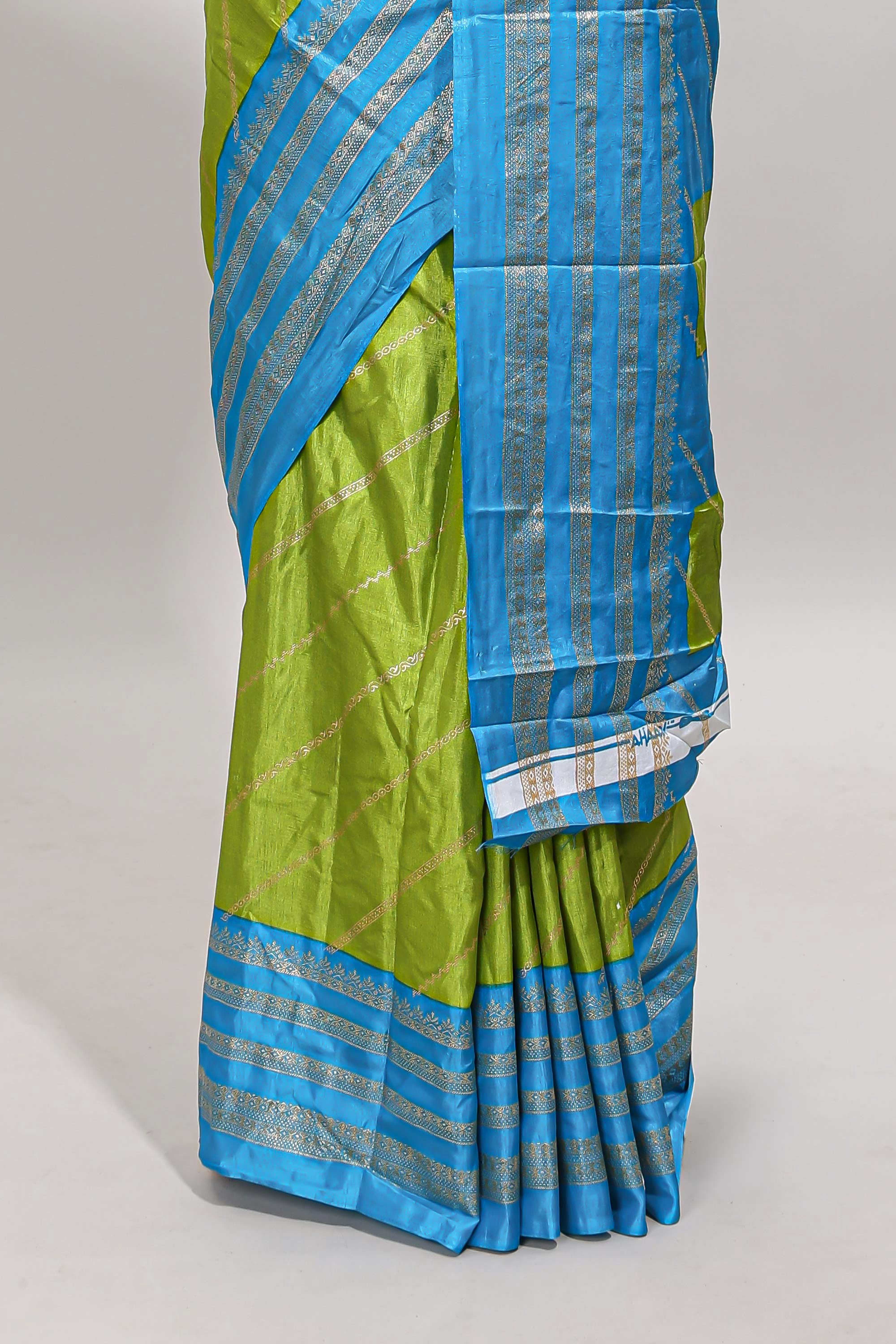 Lime green zari striped saree in dola silk with contrast woven border and blouse